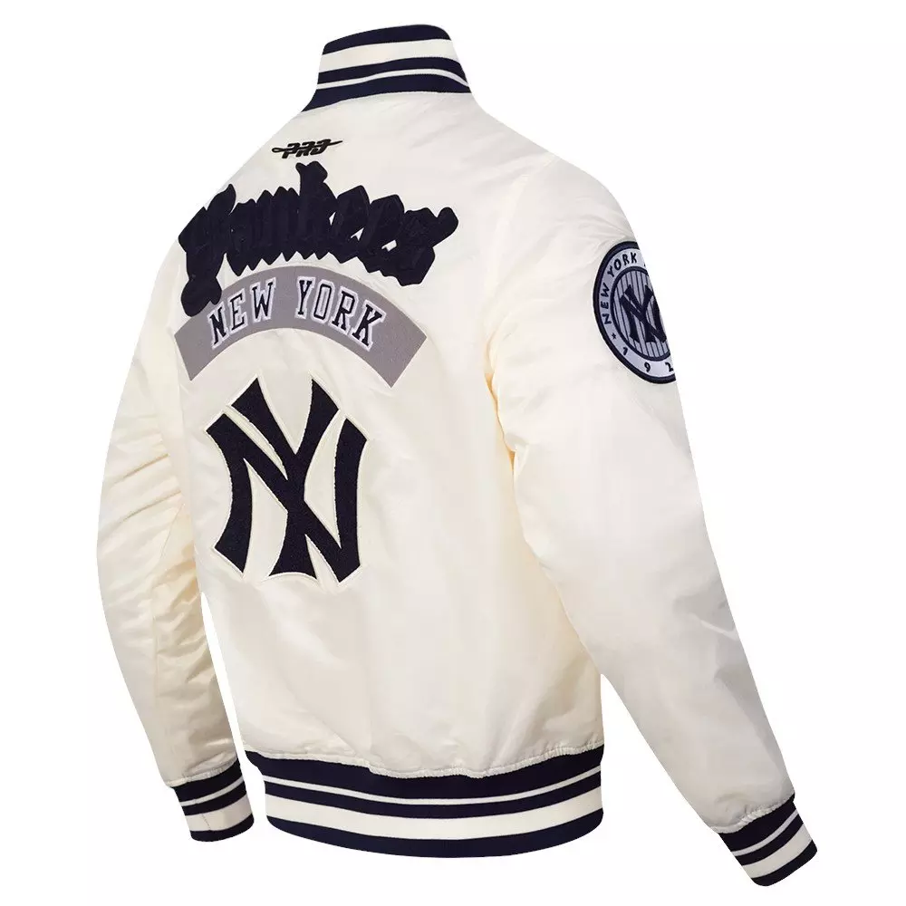Pro Standard Men's MLB New York Yankees Best Of Rib Satin Jacket - Eggshell/Navy - EGGSHELL/NAVY