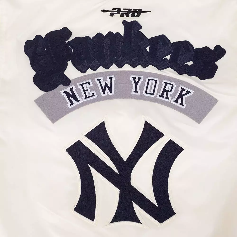 Pro Standard Men's MLB New York Yankees Best Of Rib Satin Jacket - Eggshell/Navy - EGGSHELL/NAVY