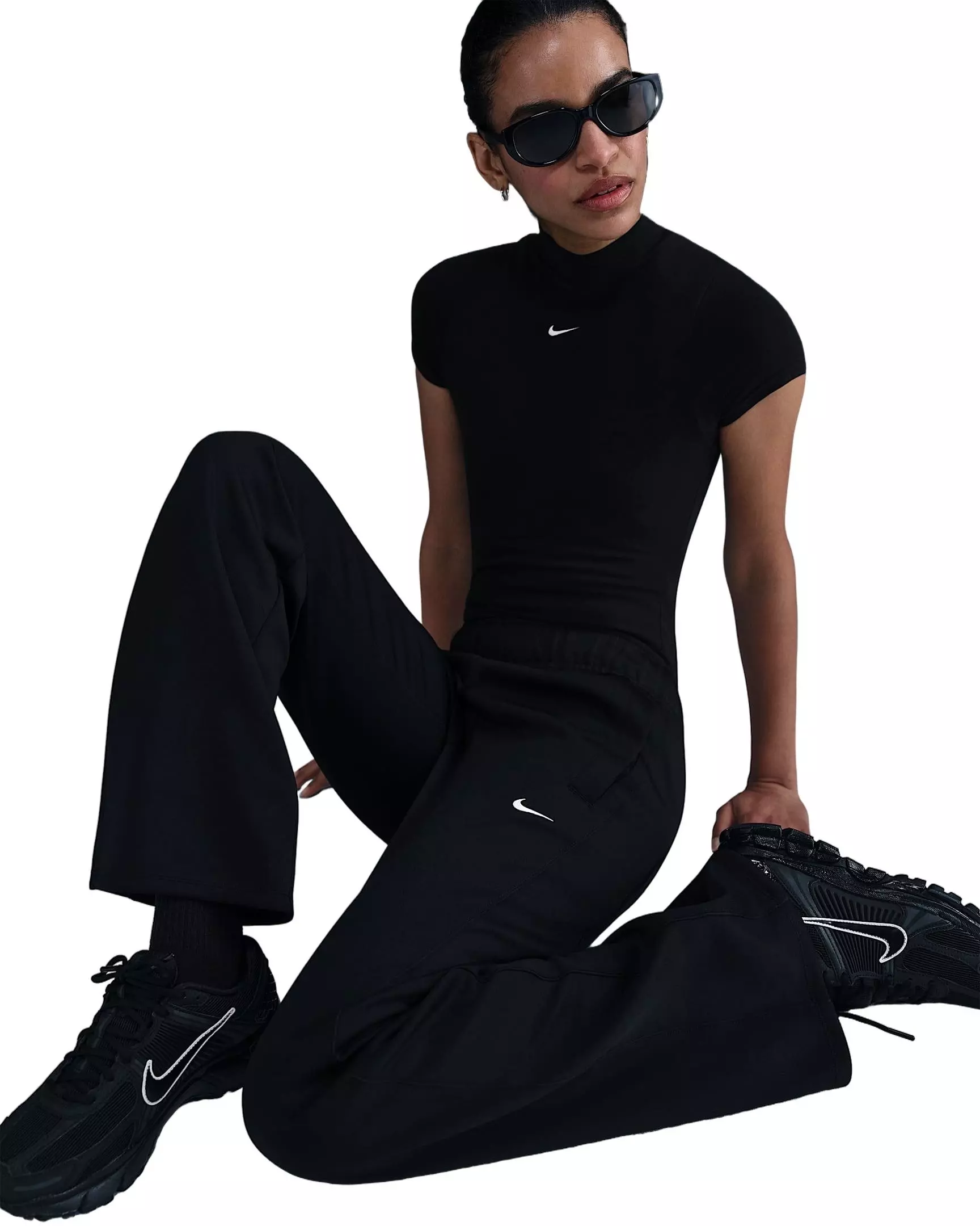 Nike Women's Sportswear Windrunner Mid-Rise Slim Knit Pants -Black - BLACK