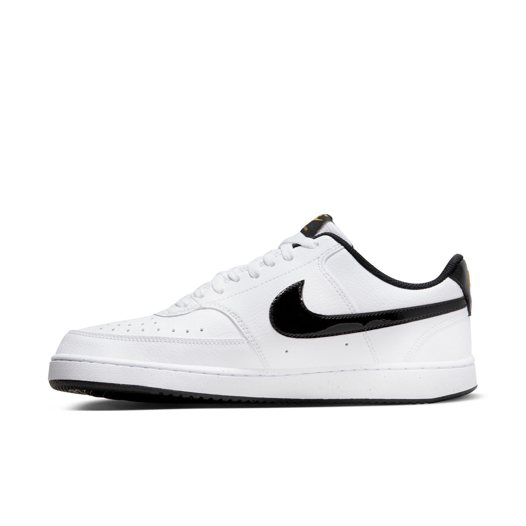 White nike shoes with black outlet logo