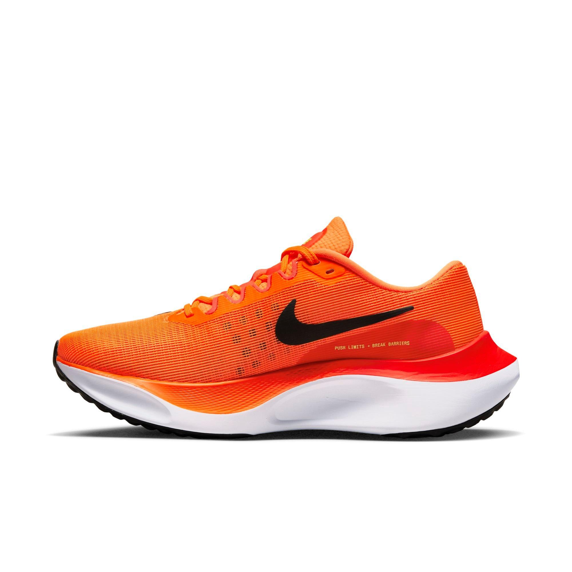 Orange nike running sales shoes