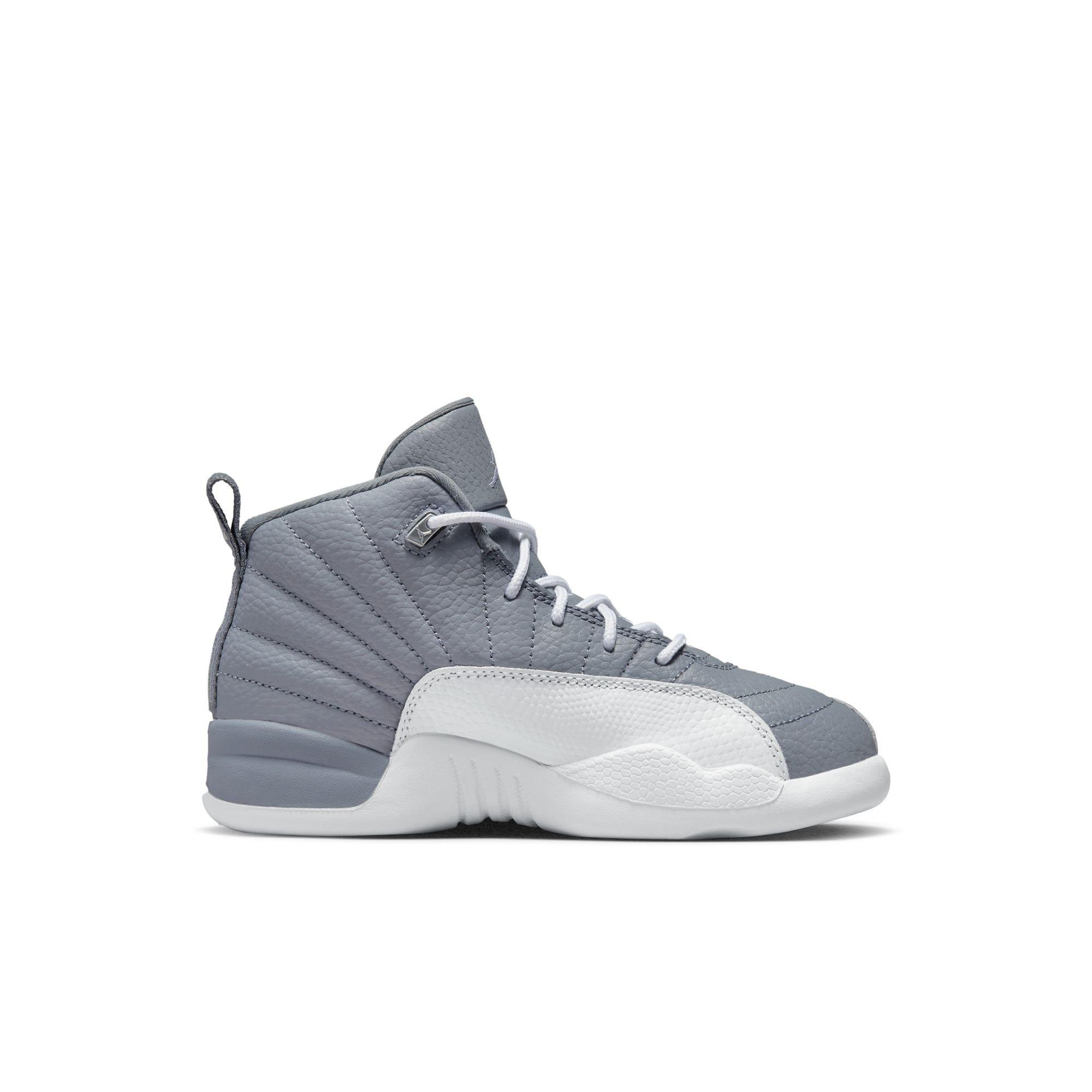 grey and white jordans 12