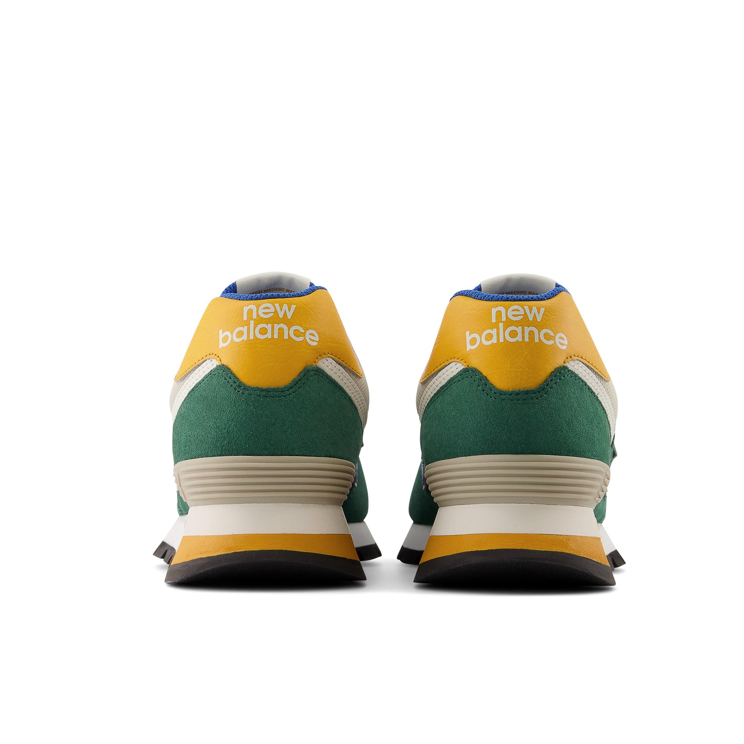 Green and yellow store new balance 574