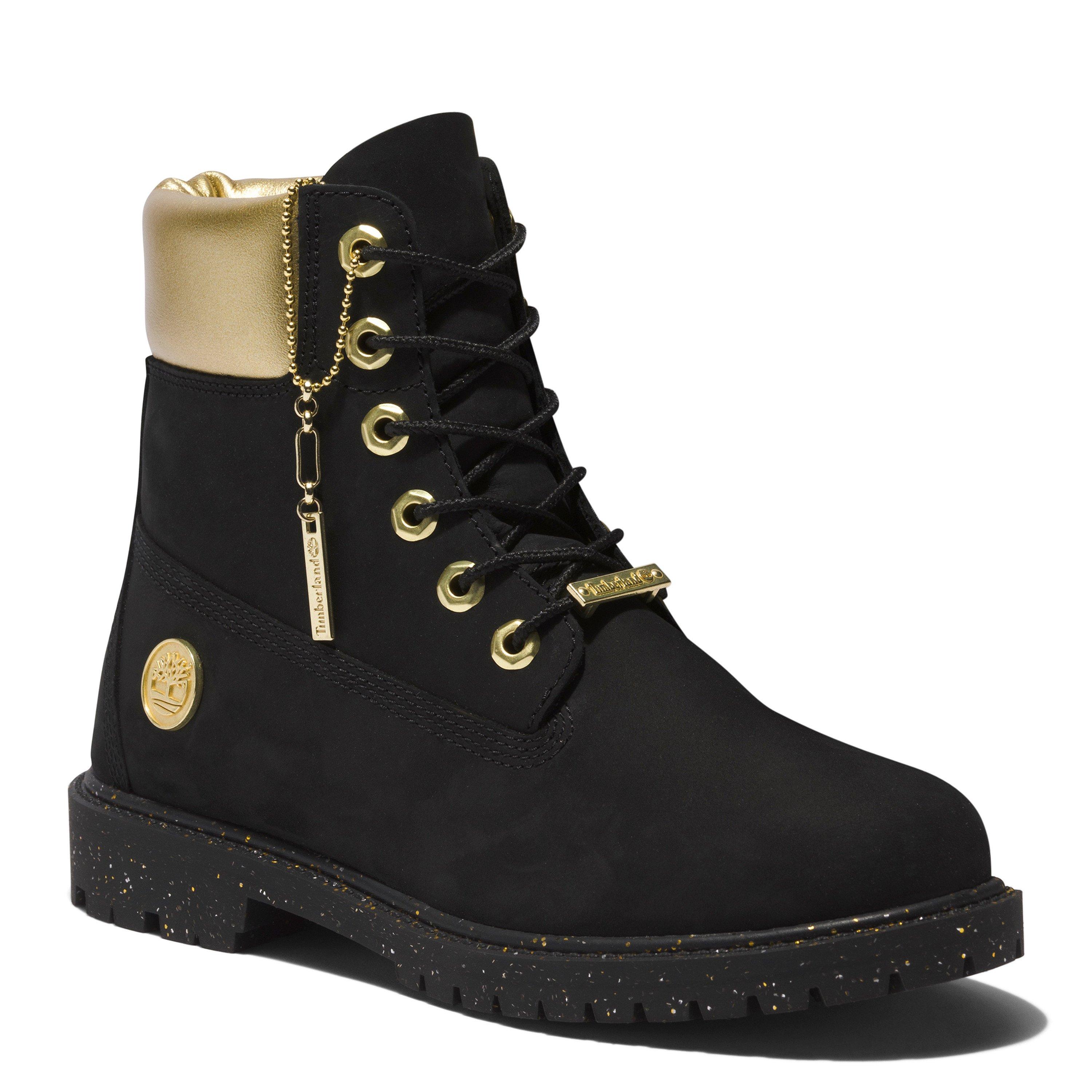 Black timbs best sale with gold chains