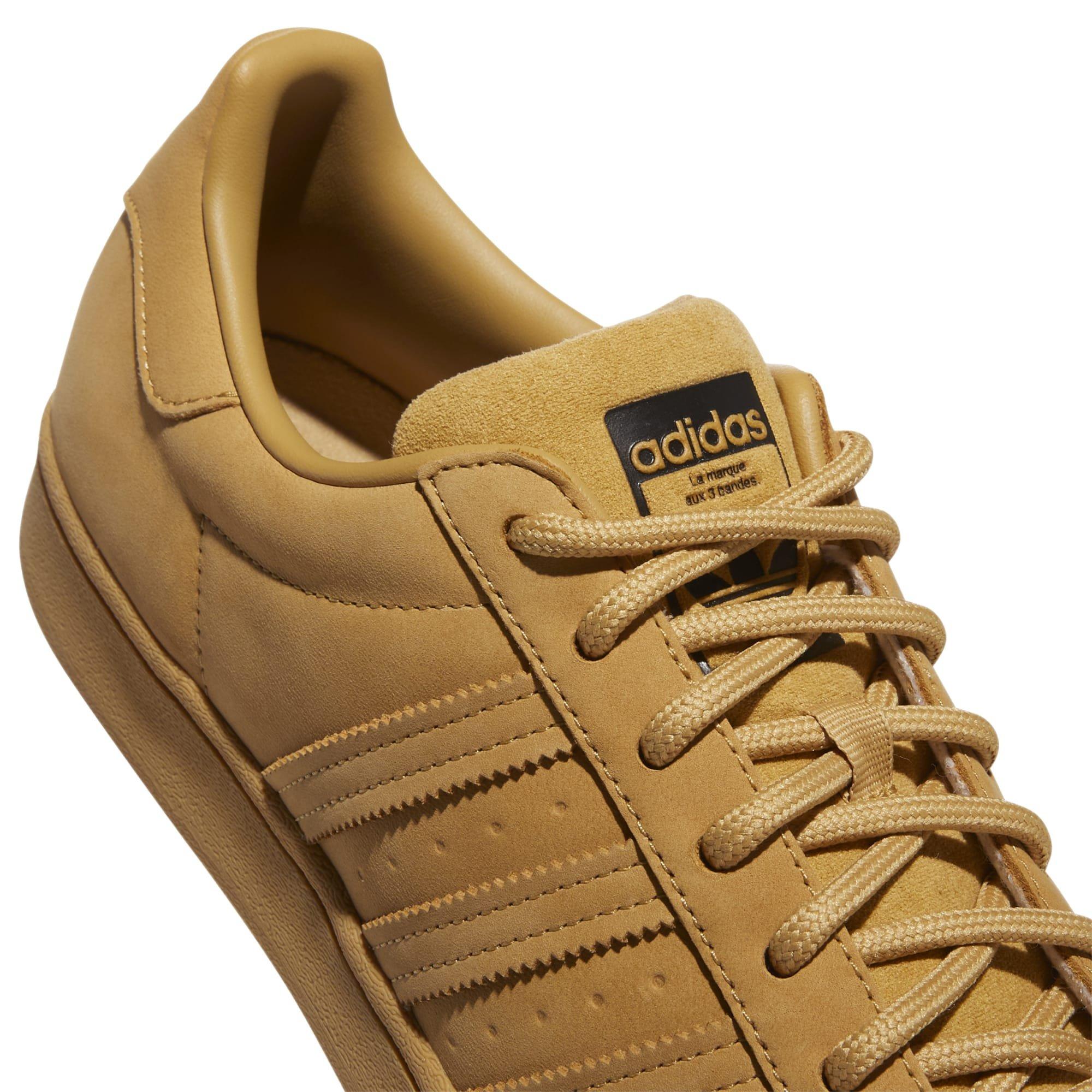 Adidas shell hot sale toe gold