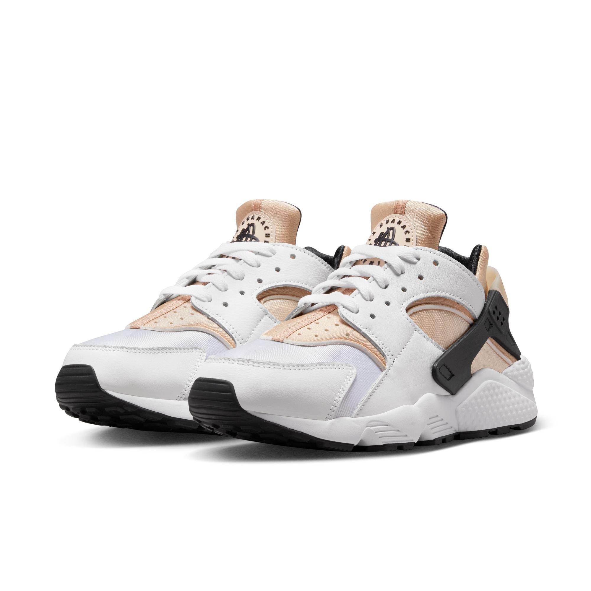 Tan and white store huaraches