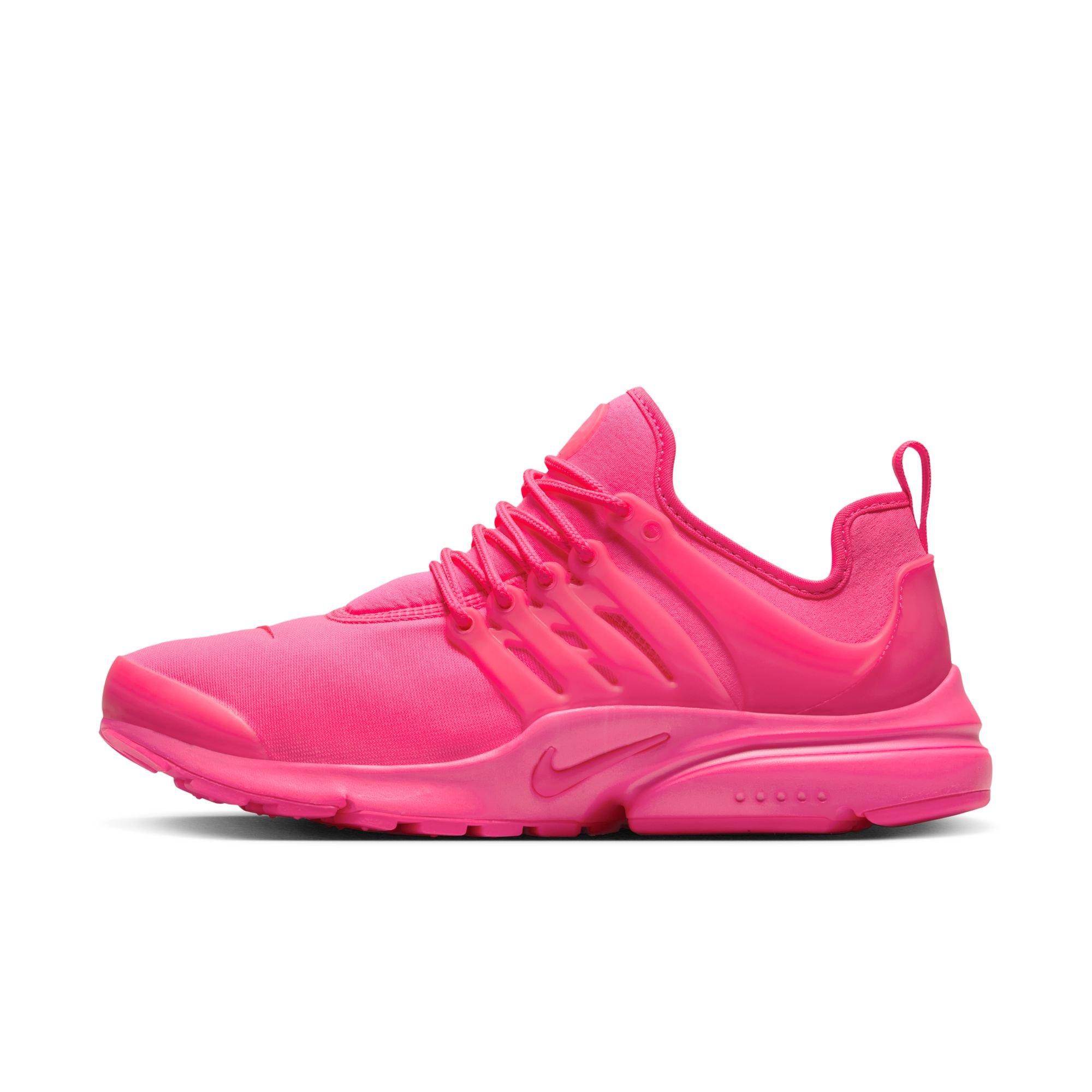 Women's pink outlet nike tennis shoes