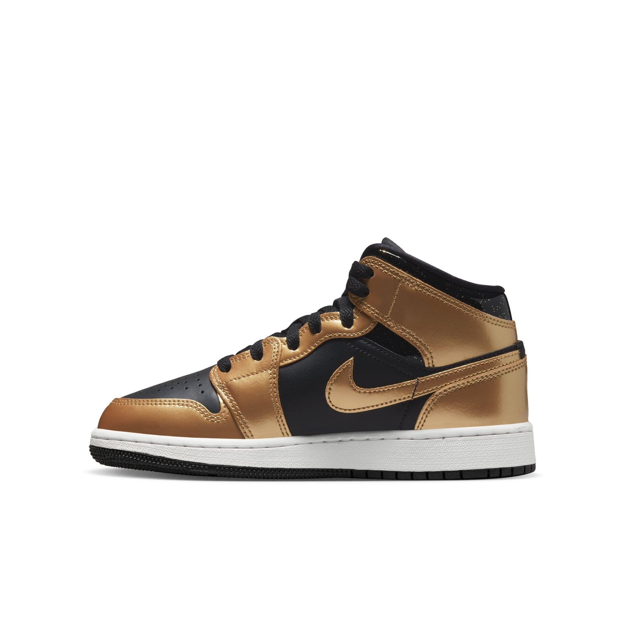 Black and gold shop jordans grade school