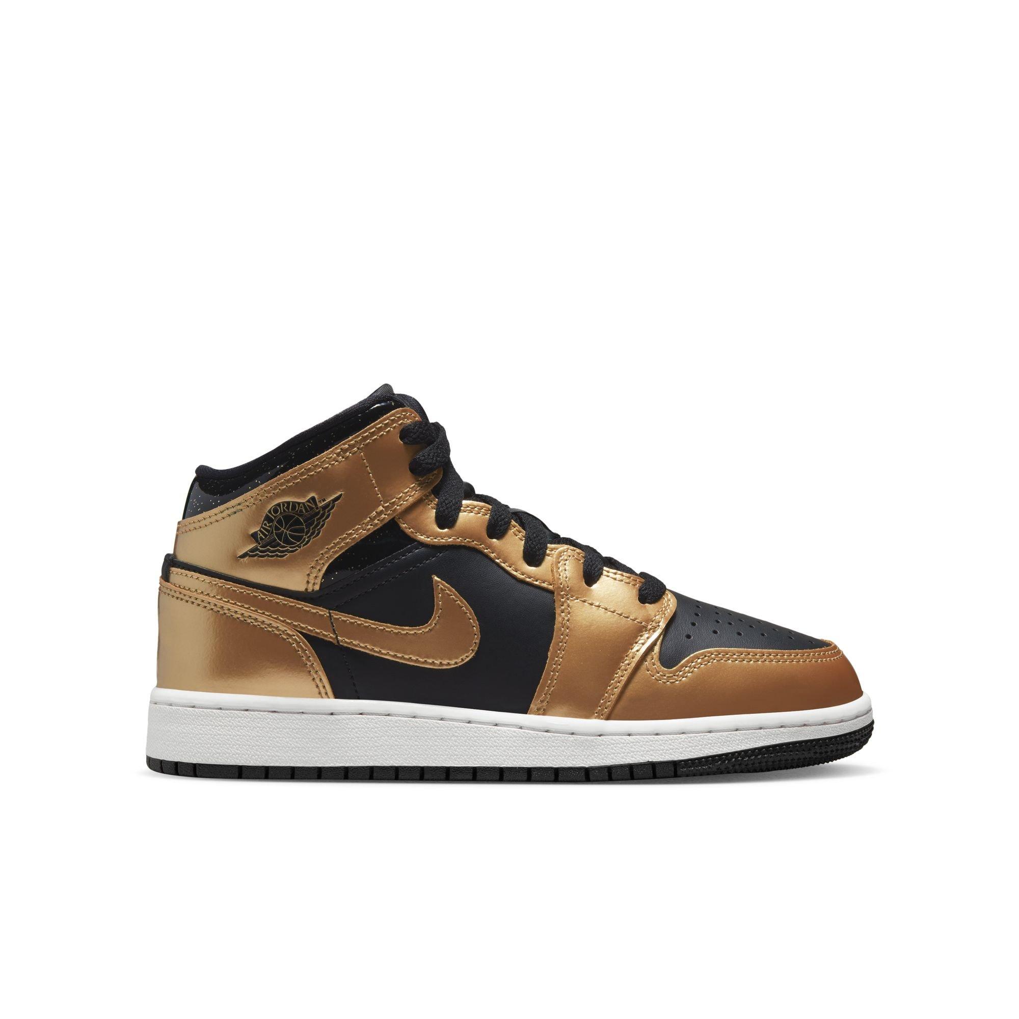 Black and gold jordans best sale grade school