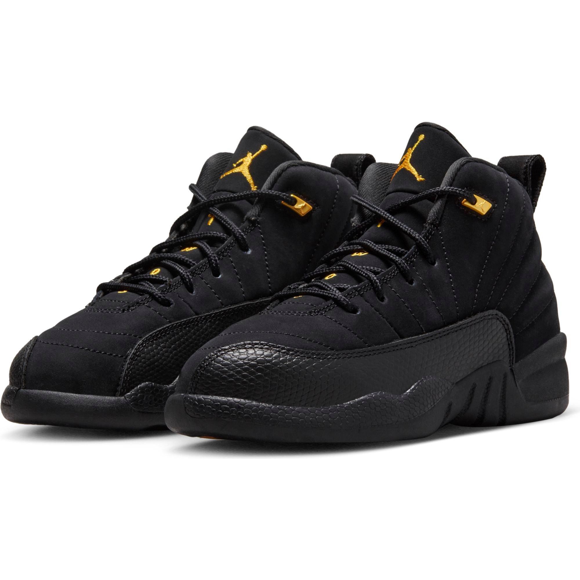 Jordans retro 12 on sale black and gold