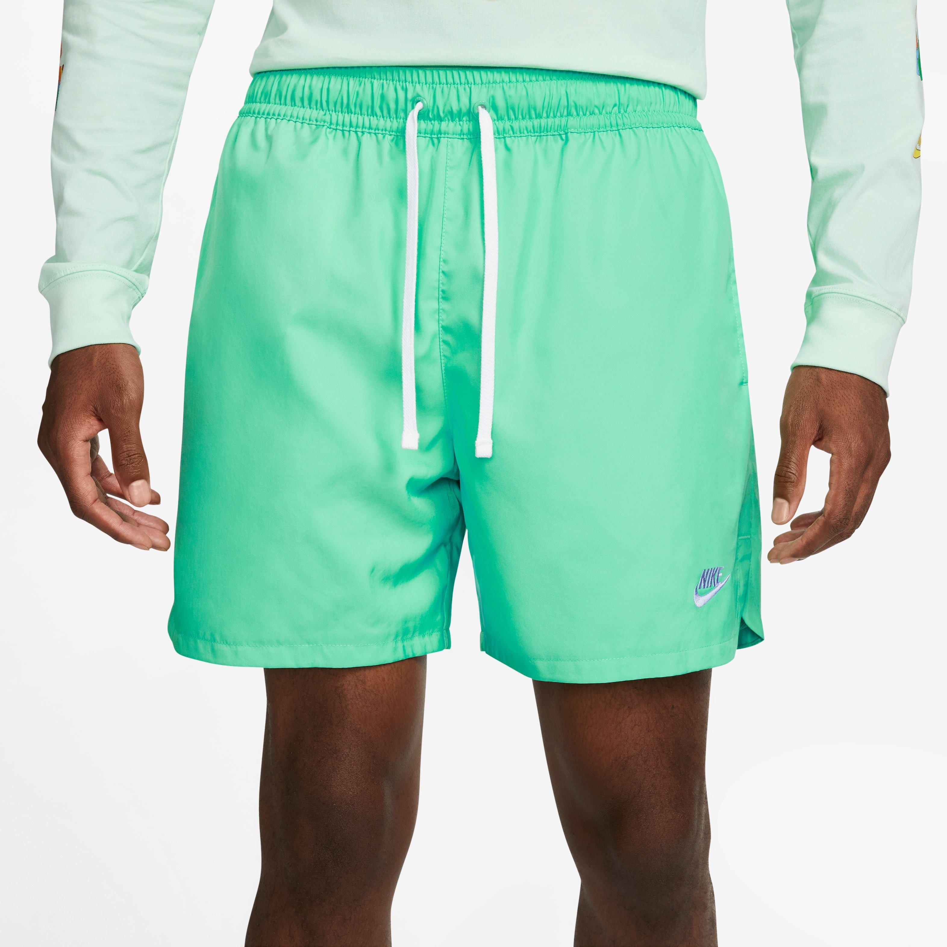 Nike woven best sale shorts teal