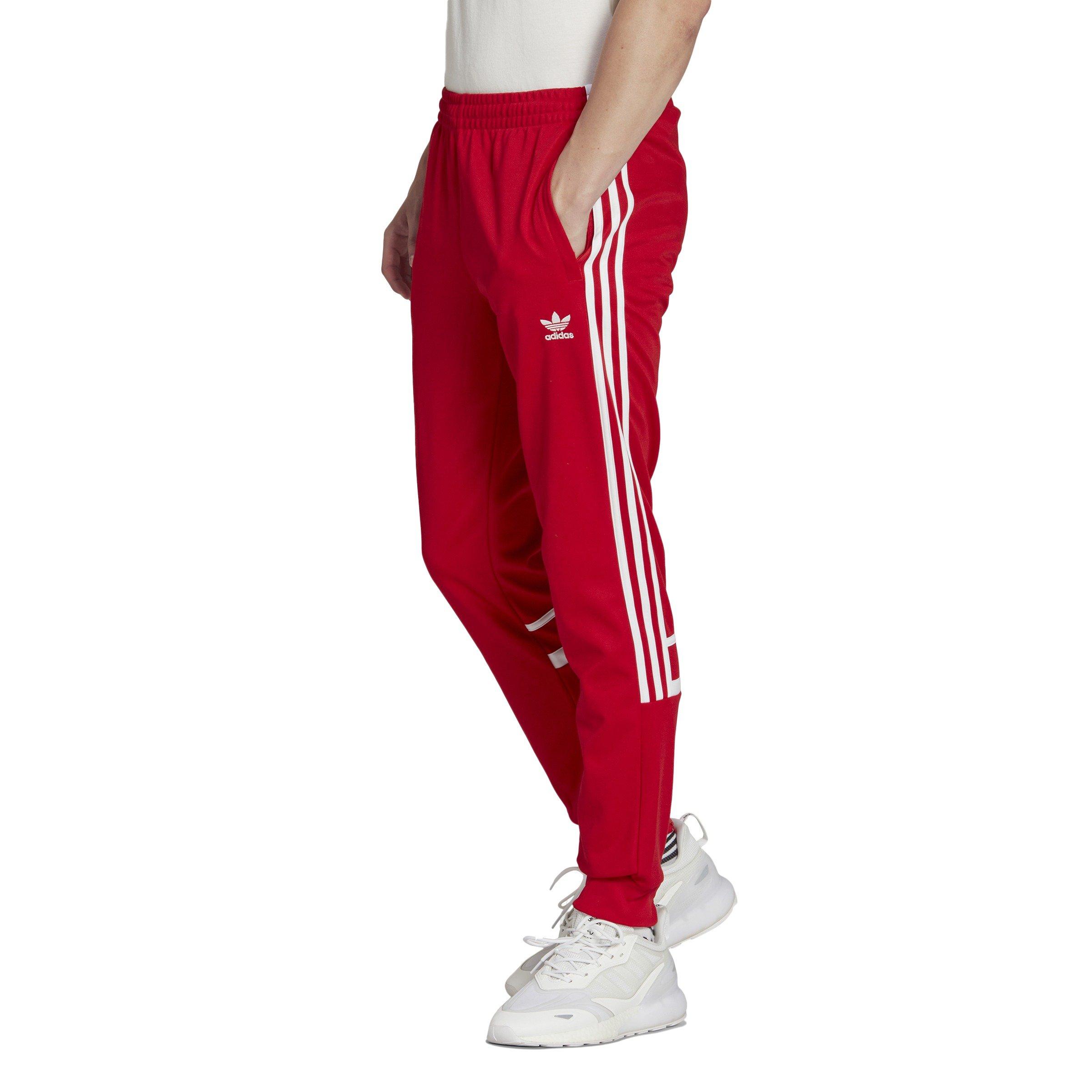 Adidas sst pants on sale red