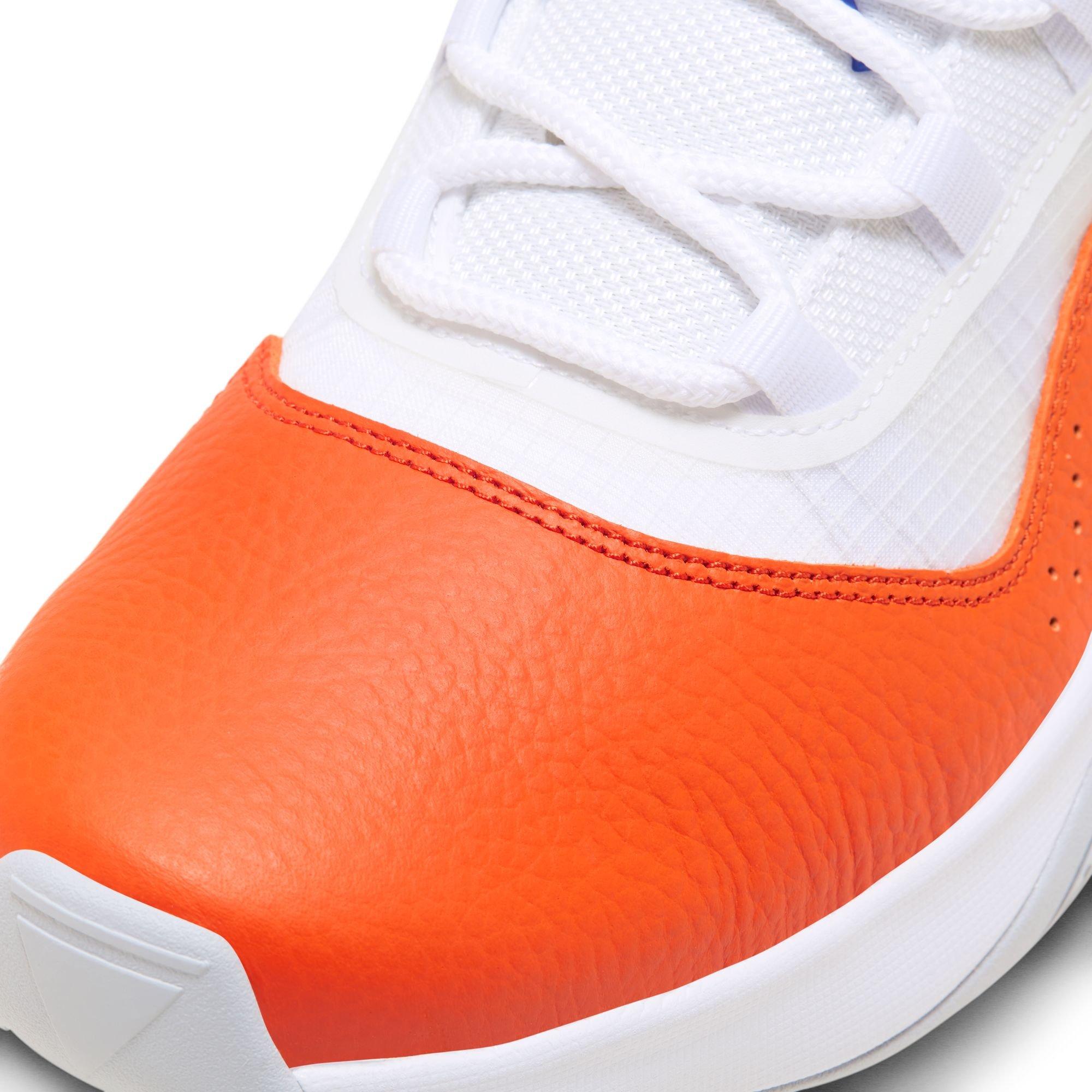 Orange and white outlet low top 11s