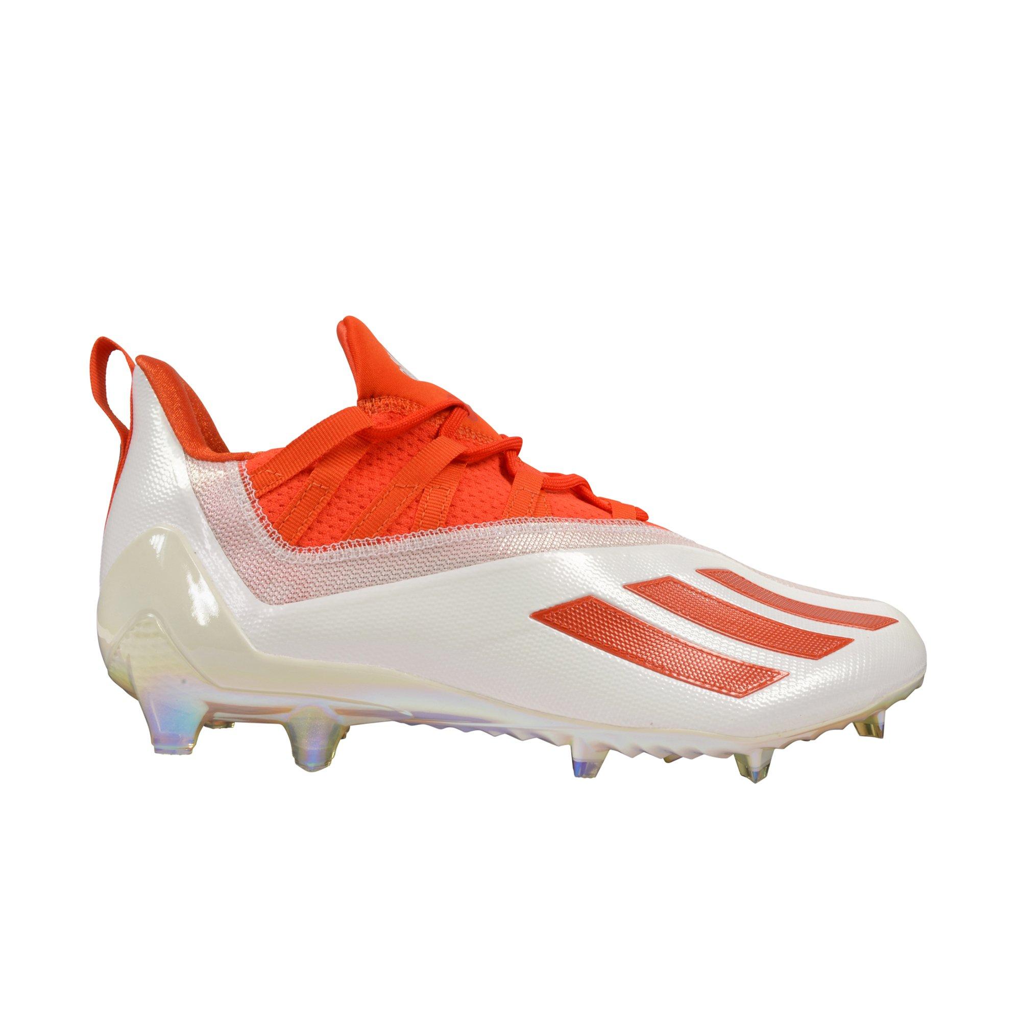 Orange and white 2025 adidas football cleats