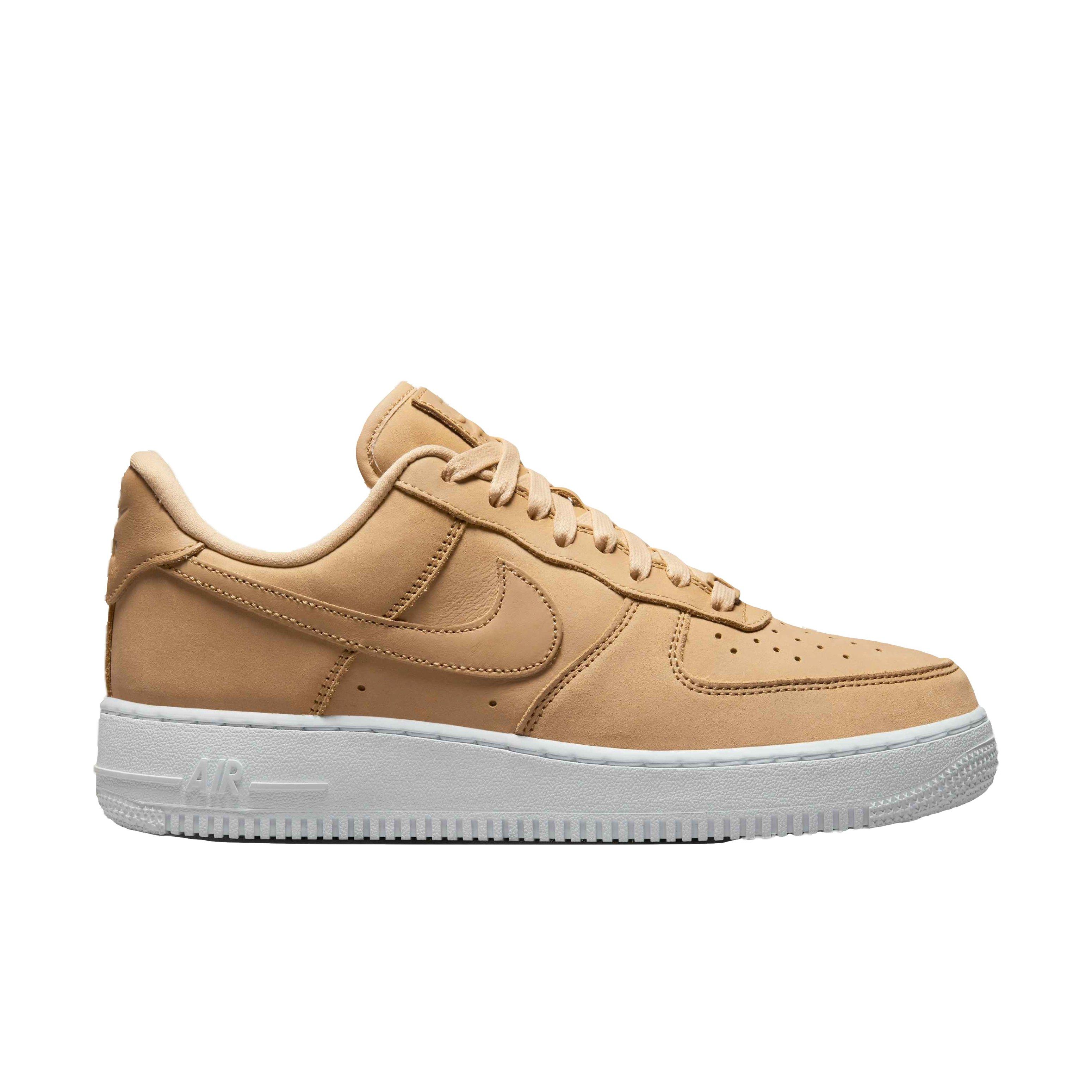 Premium Vachetta Tan Leather Drapes Over This Nike Air Force 1 Low