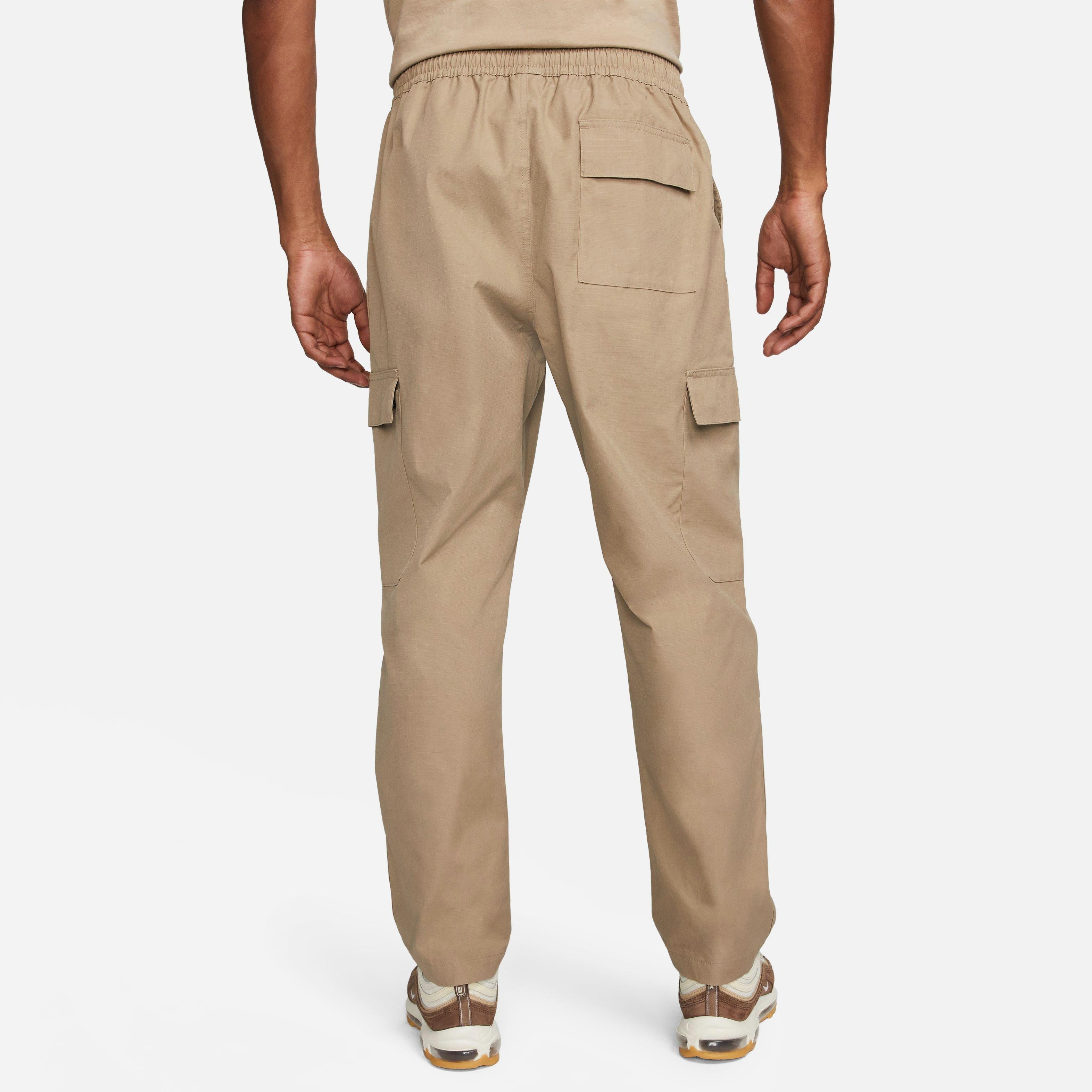 Nike Club Men's Woven Tapered-Leg Trousers. Nike AU