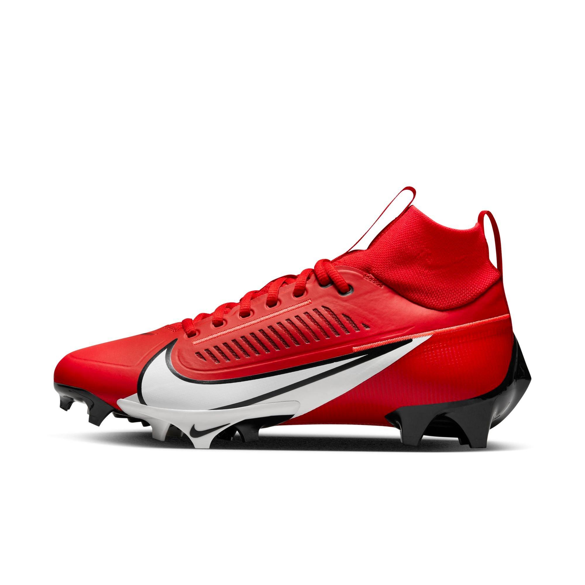 Red black and store white football cleats