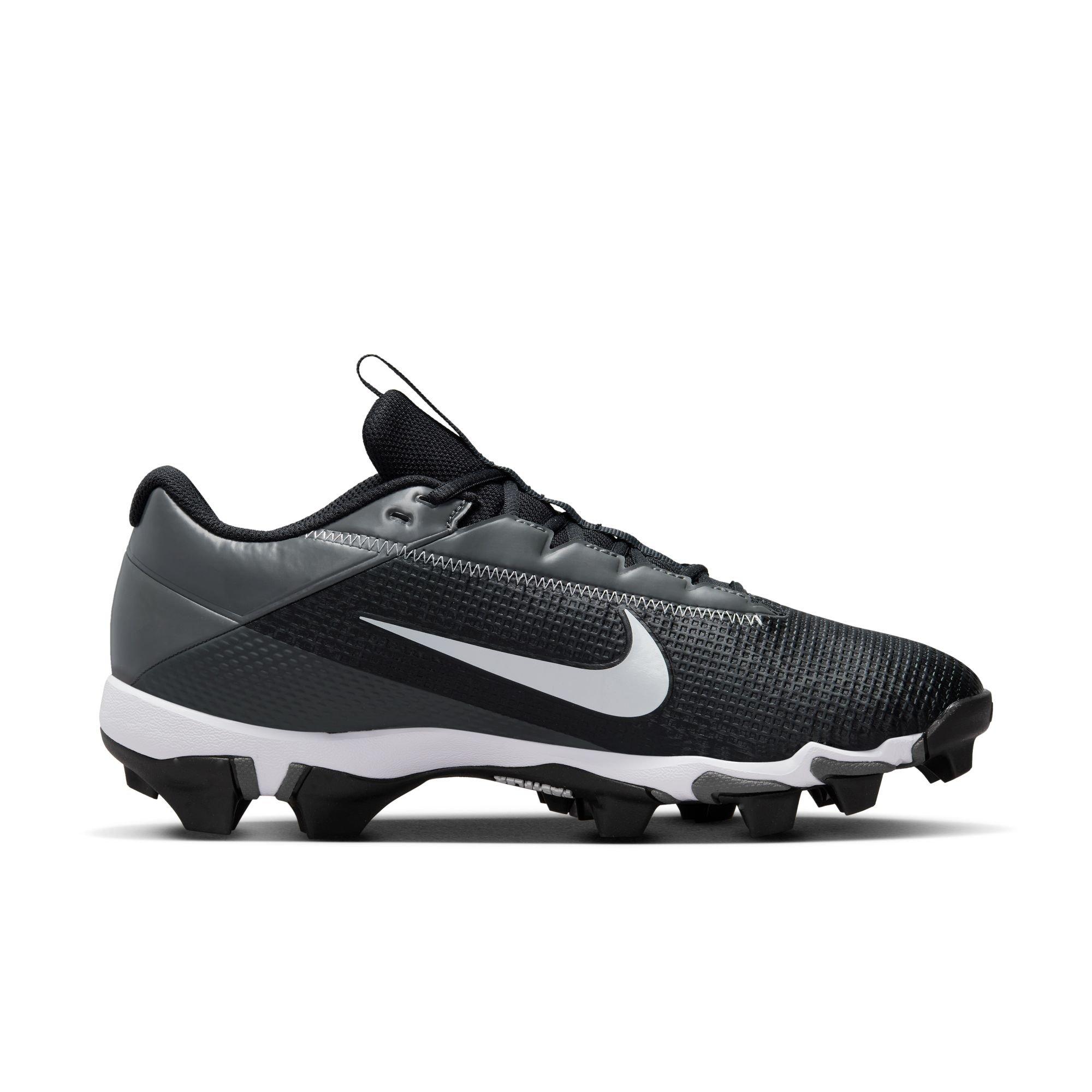 Nike black best sale and white cleats