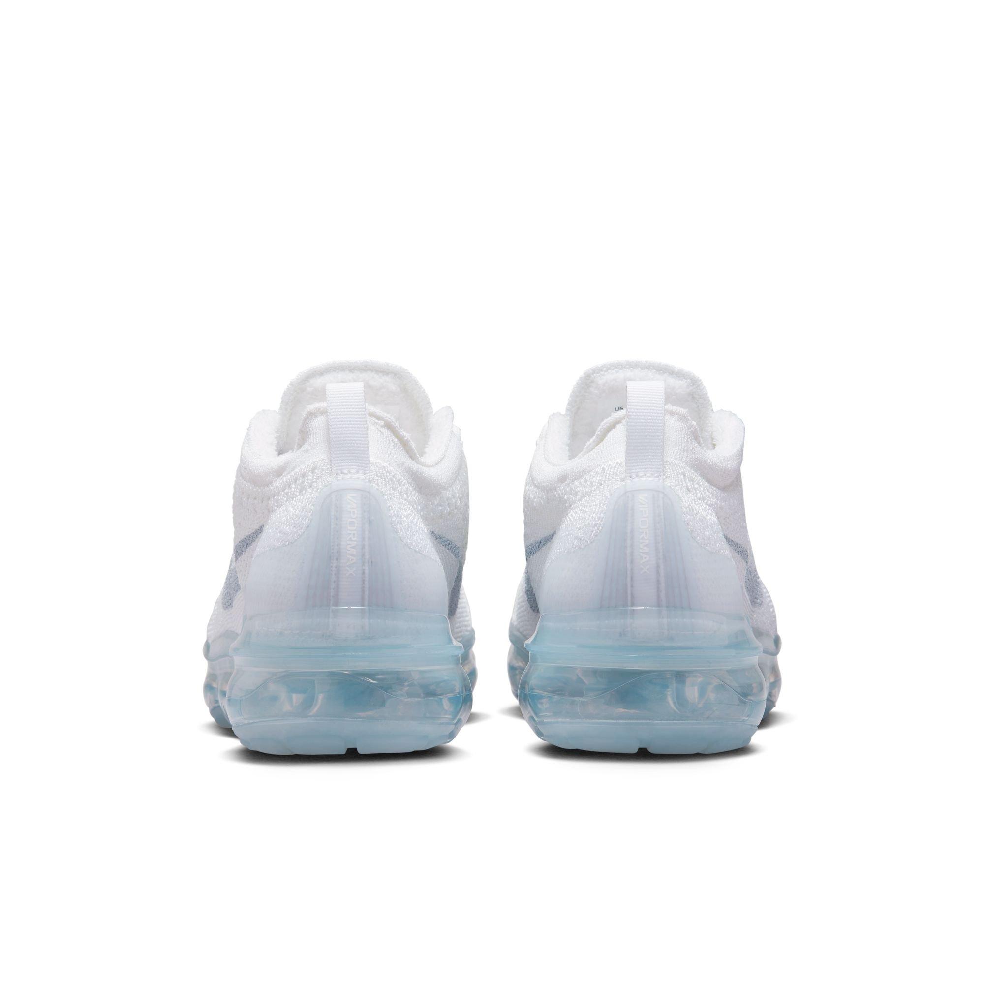 White vapormax shop with blue bottom