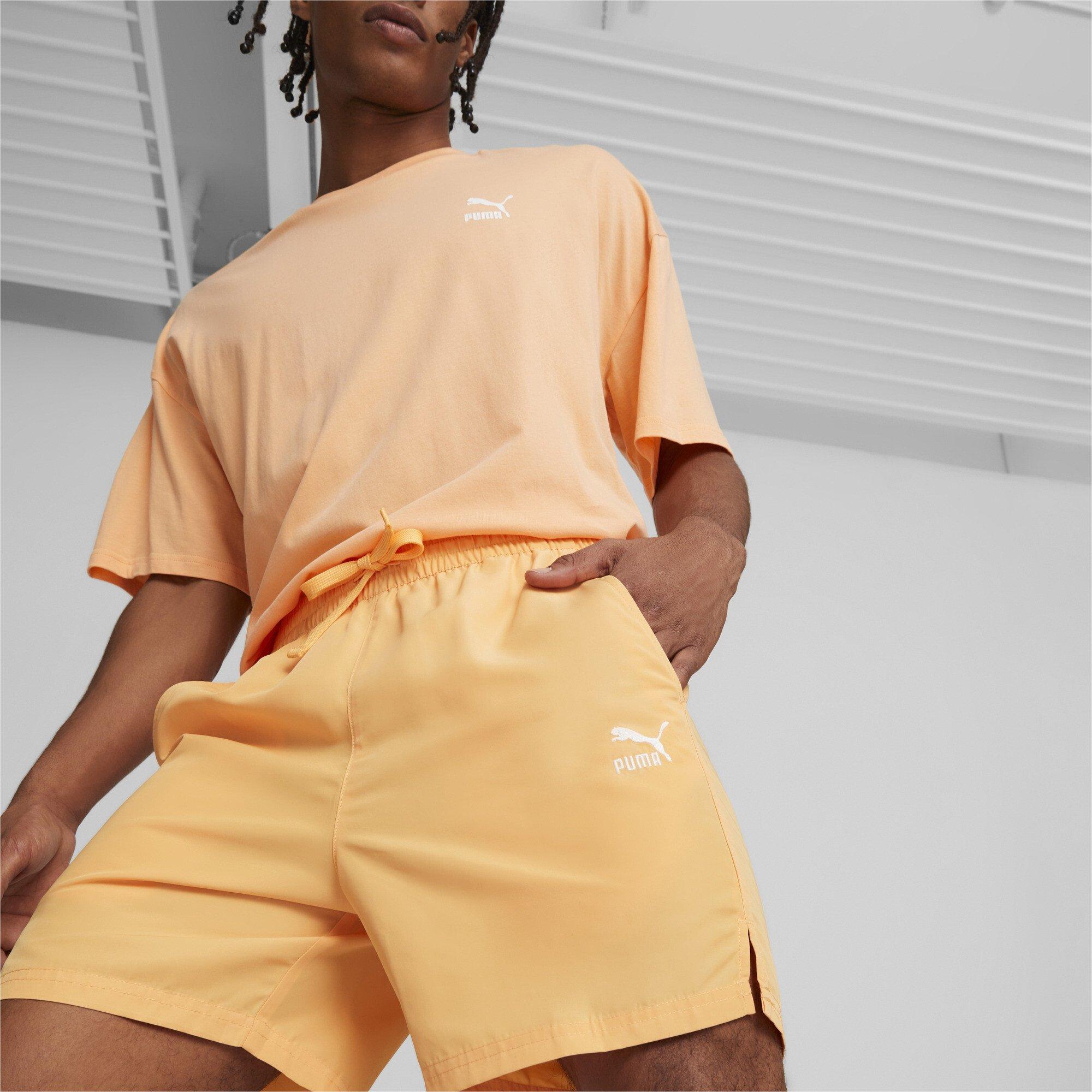 PUMA Men's Classic Worldwide 6-Inch Woven Shorts - ORANGE Thumbnail View 1
