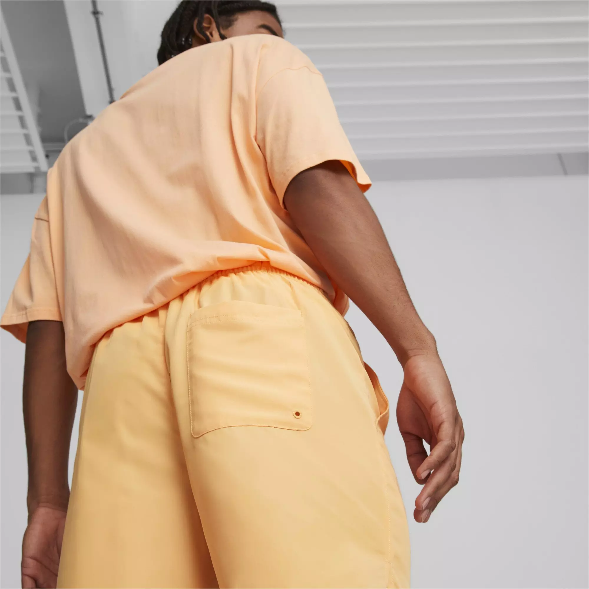 PUMA Men's Classic Worldwide 6-Inch Woven Shorts - ORANGE