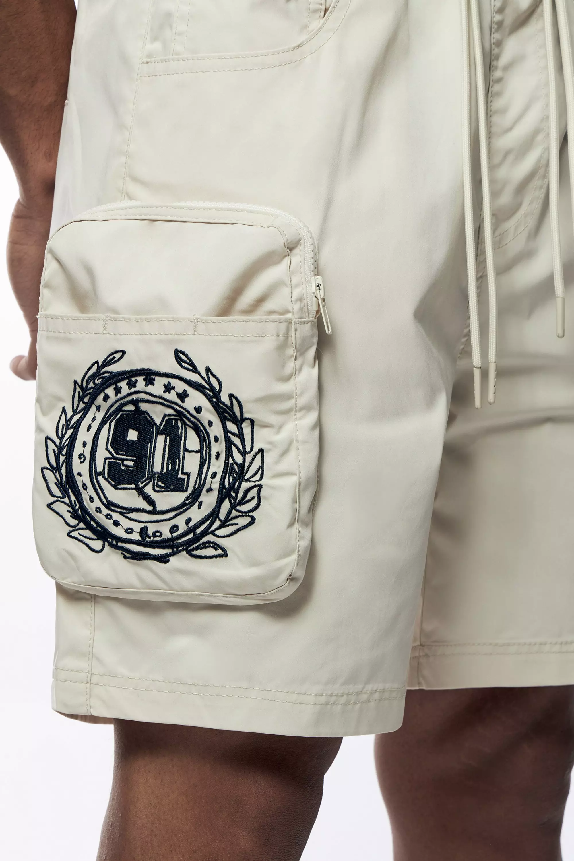 Smoke Rise Men's Varsity Doodle Printed Nylon Cargo Shorts - CREAM