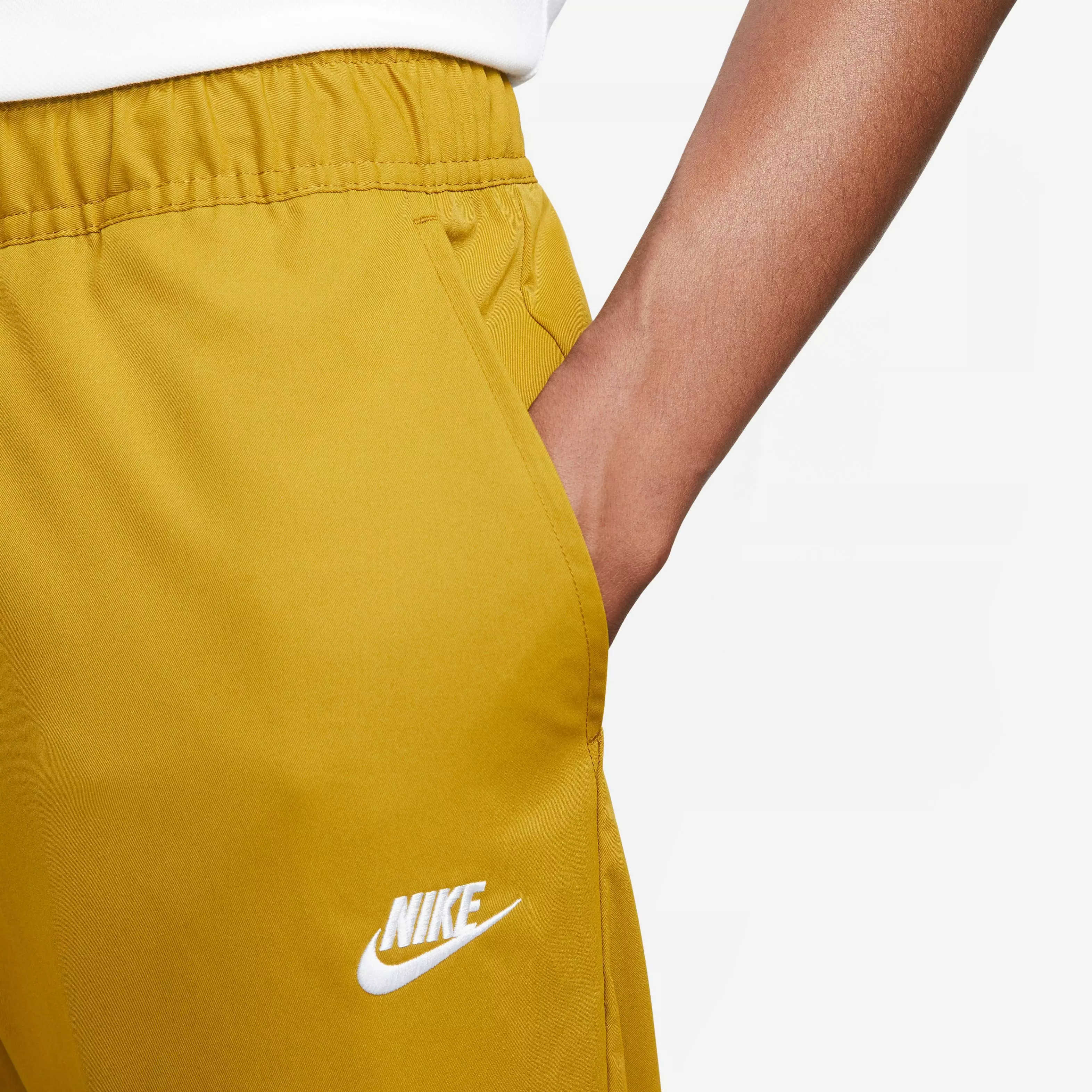 Nike Men's Club Woven Taper Pants - Brozine - GOLD
