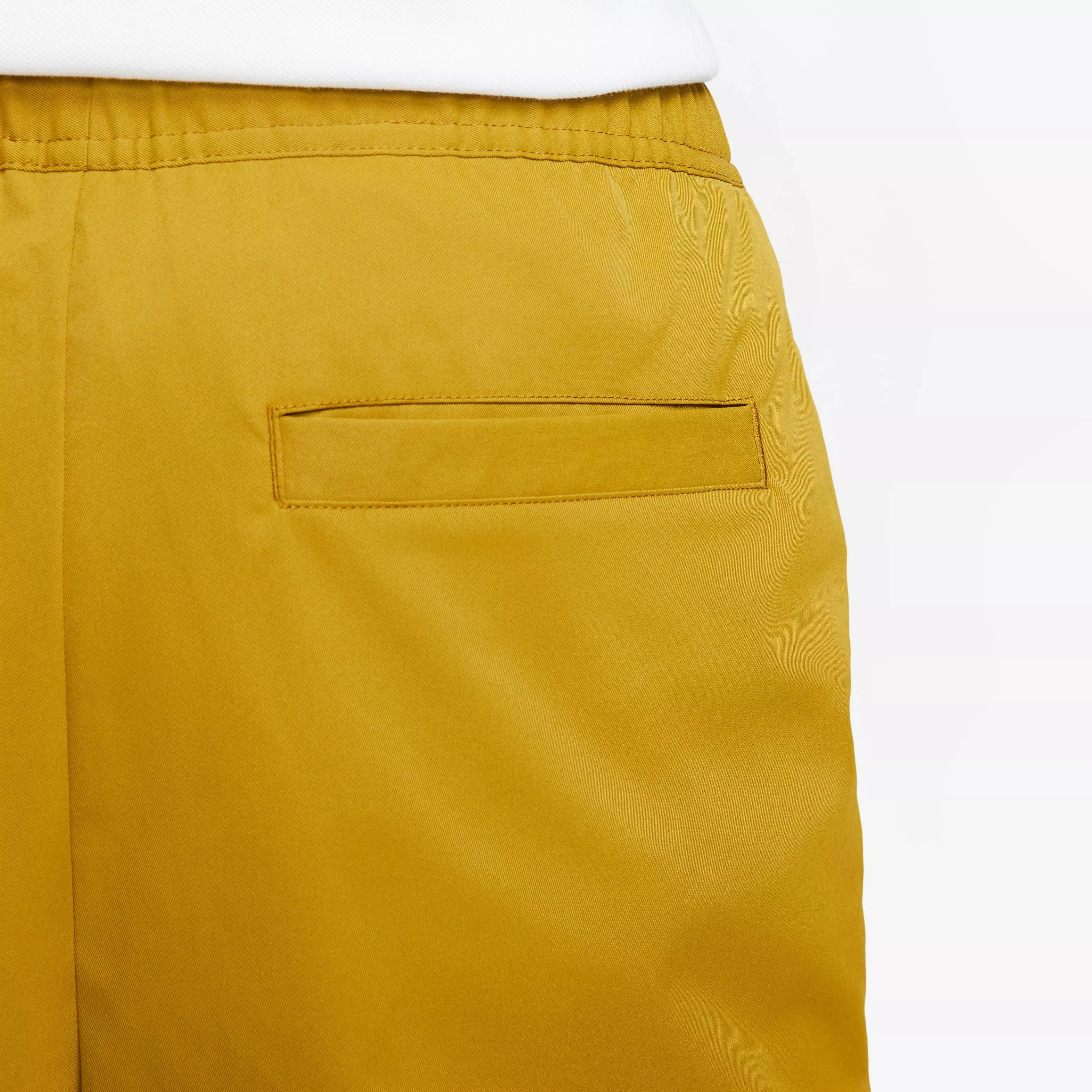 Nike Men's Club Woven Taper Pants - Brozine - GOLD