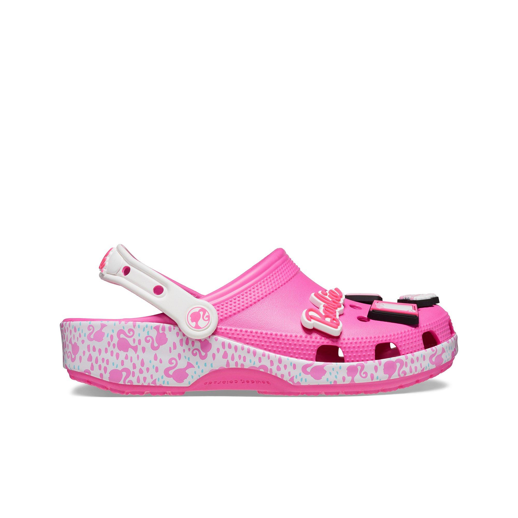 pink crocs with