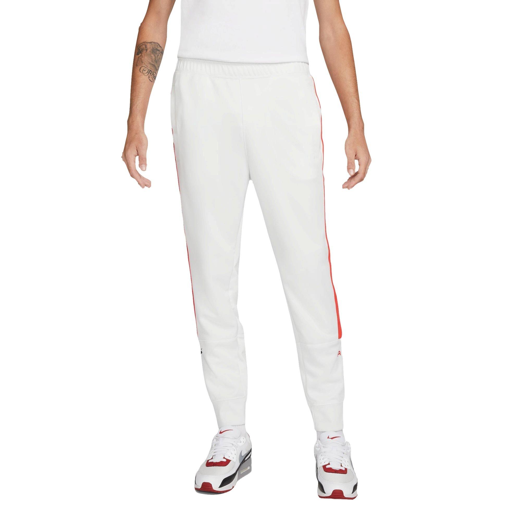 Nike track pants white stripe best sale