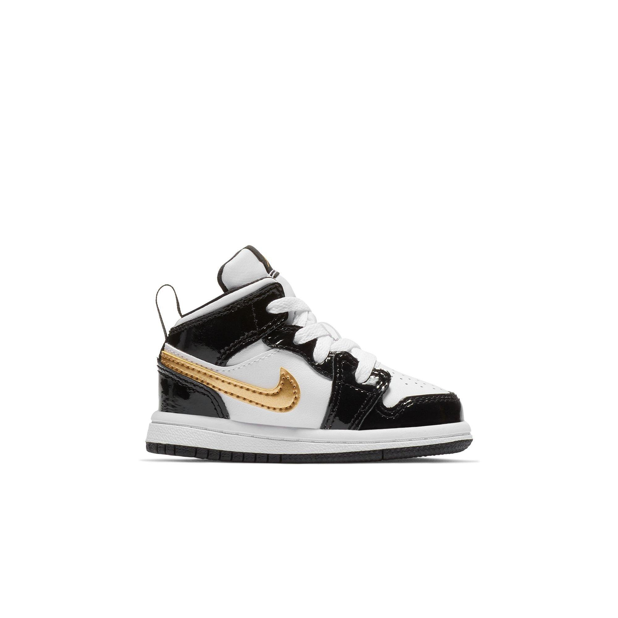 Air jordan mid black on sale gold