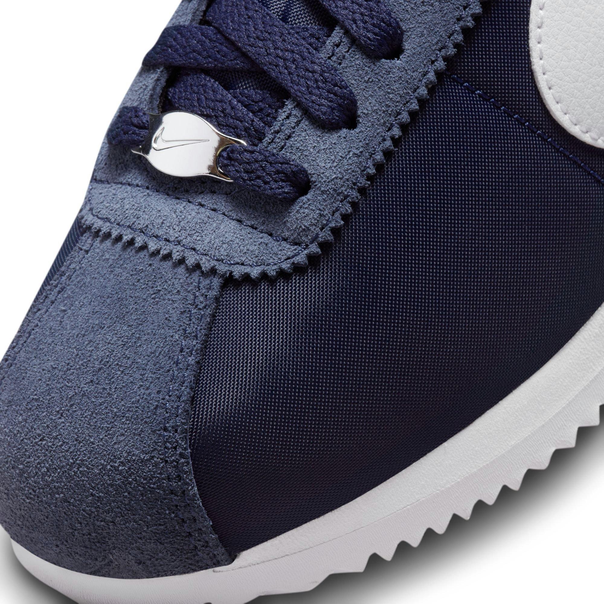 Navy blue and white cortez hotsell