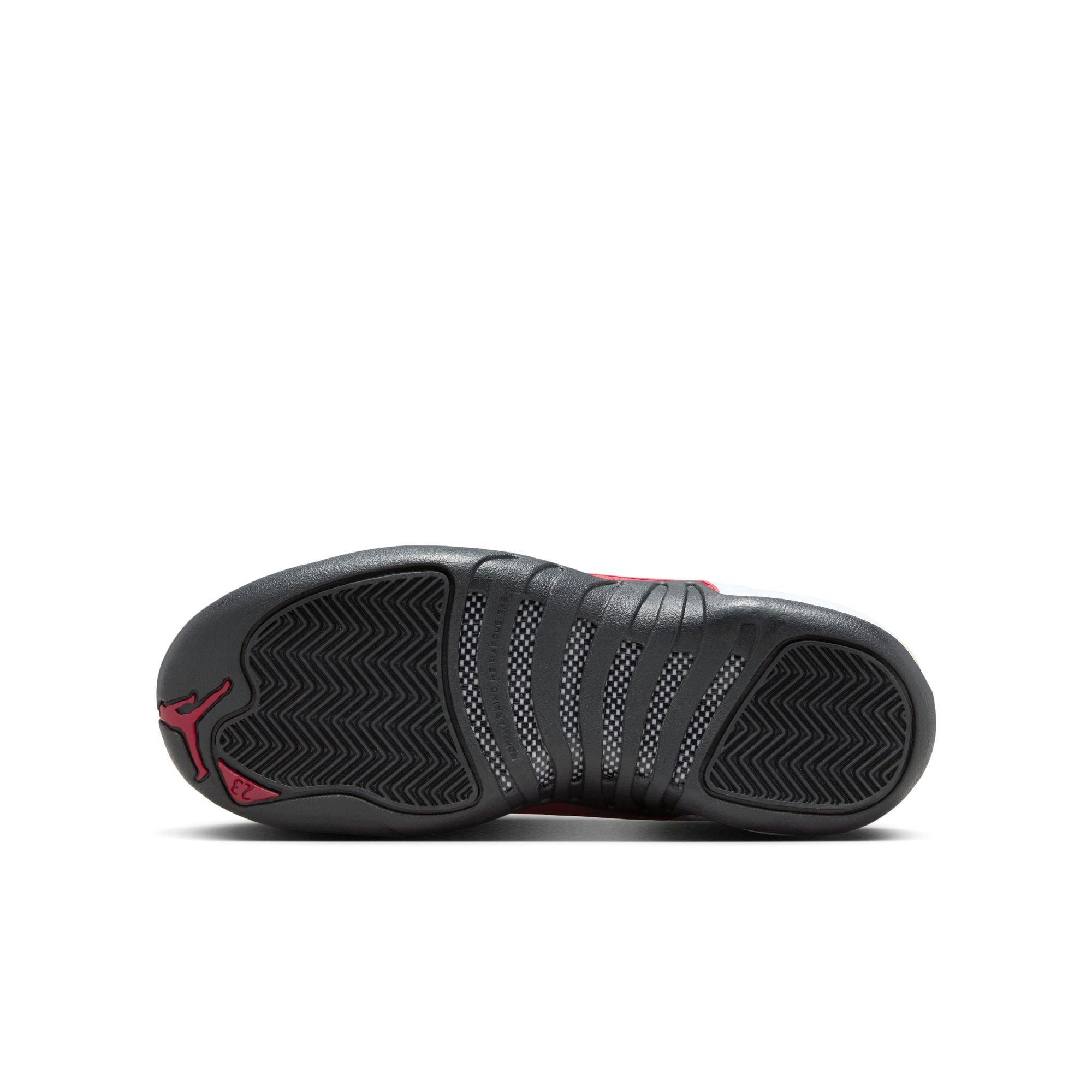 Jordan 12 Retro Grade School Kids' "Taxi Flip" Shoe