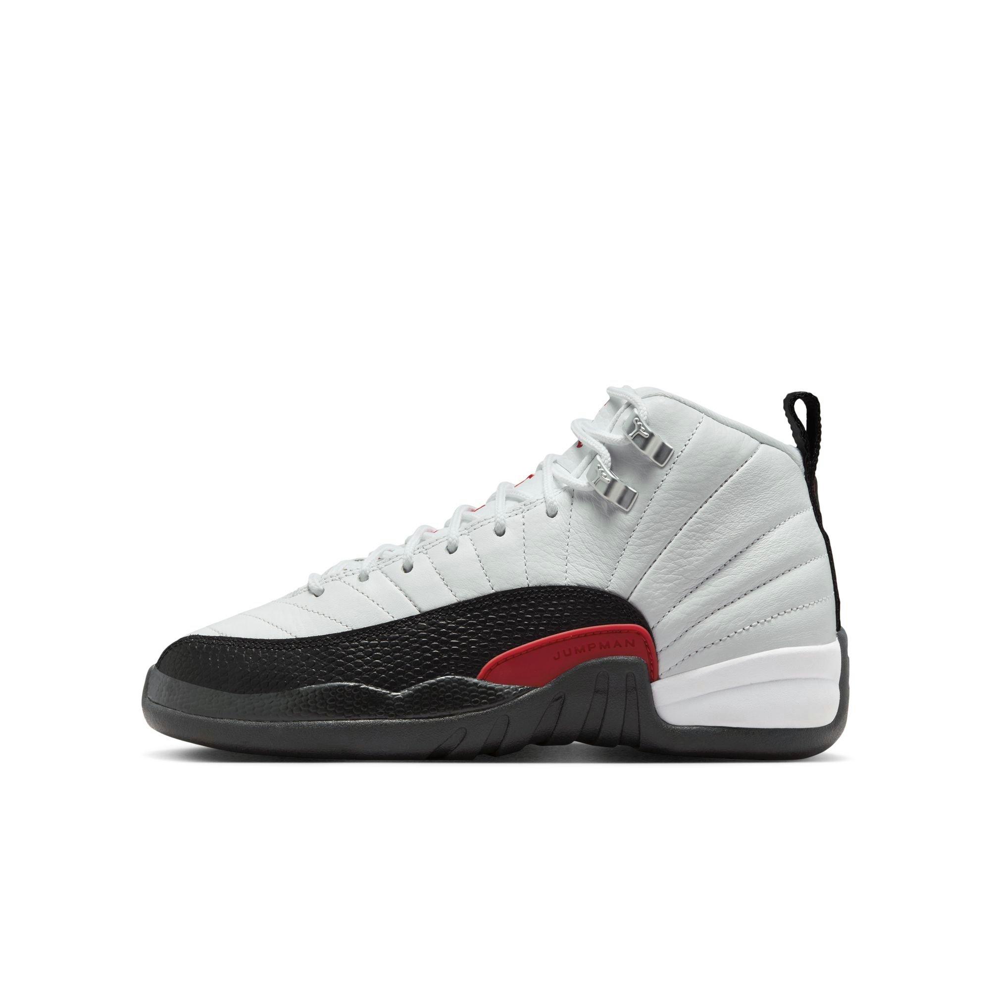 Jordan 12 Retro Grade School Kids' "Taxi Flip" Shoe