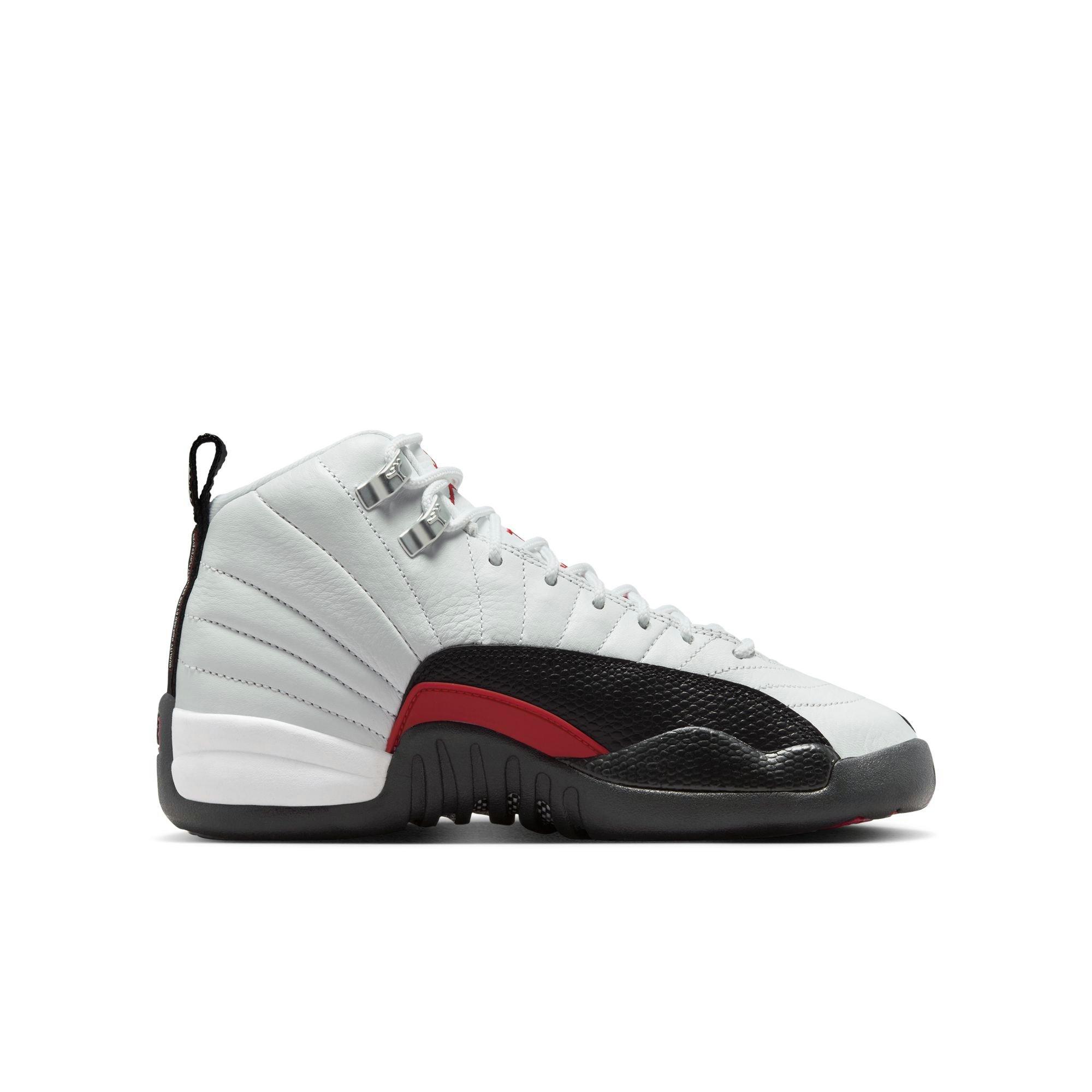 Jordan 12 Retro Grade School Kids' "Taxi Flip" Shoe