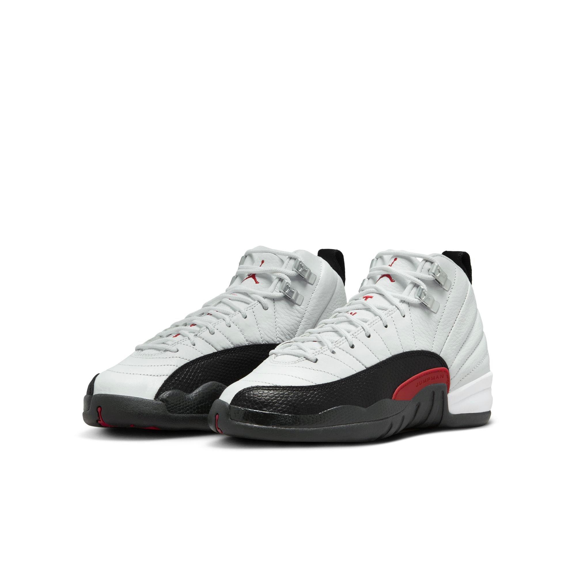 Jordan 12 Retro Grade School Kids' "Taxi Flip" Shoe