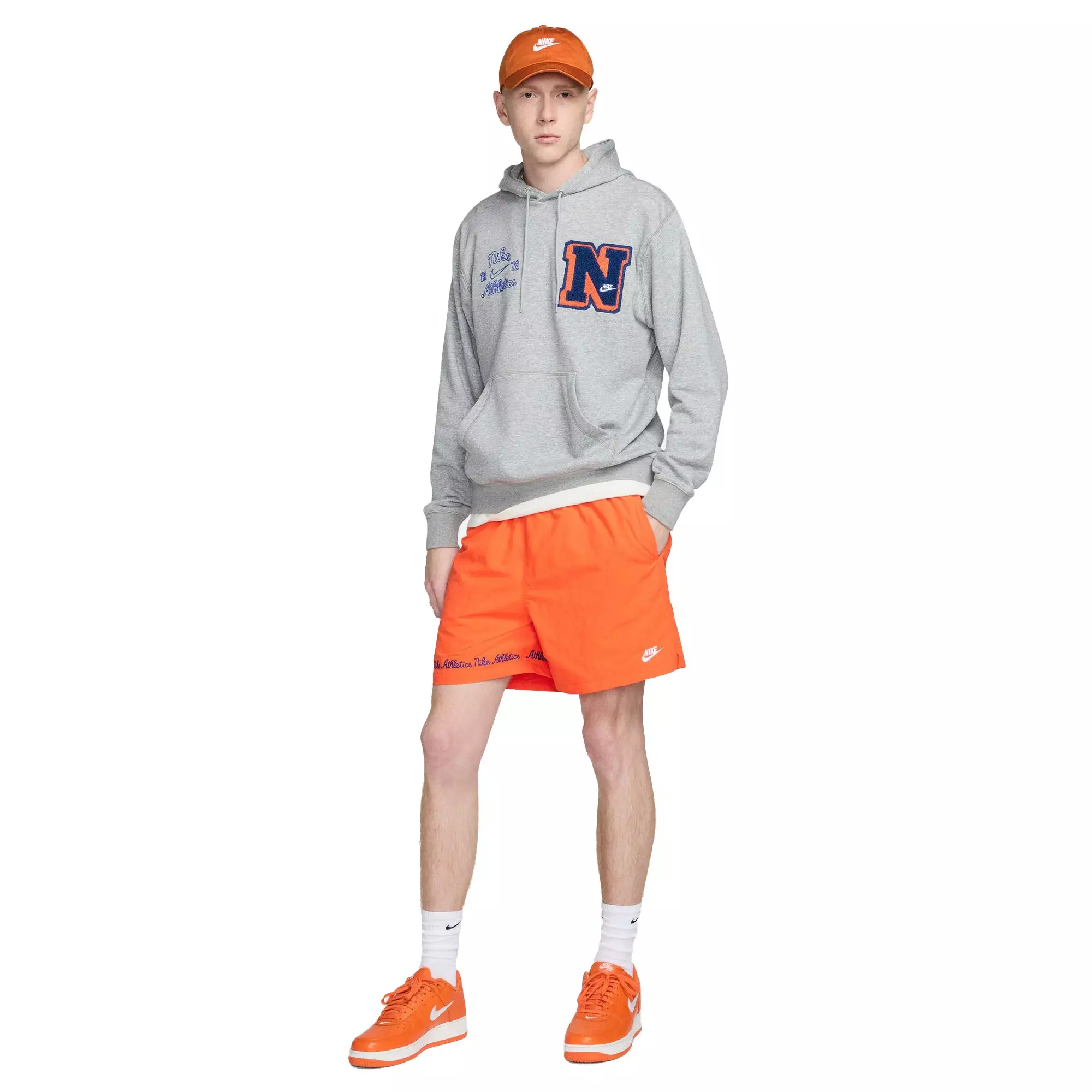 Nike Men's Woven Club Flow Shorts - ORANGE
