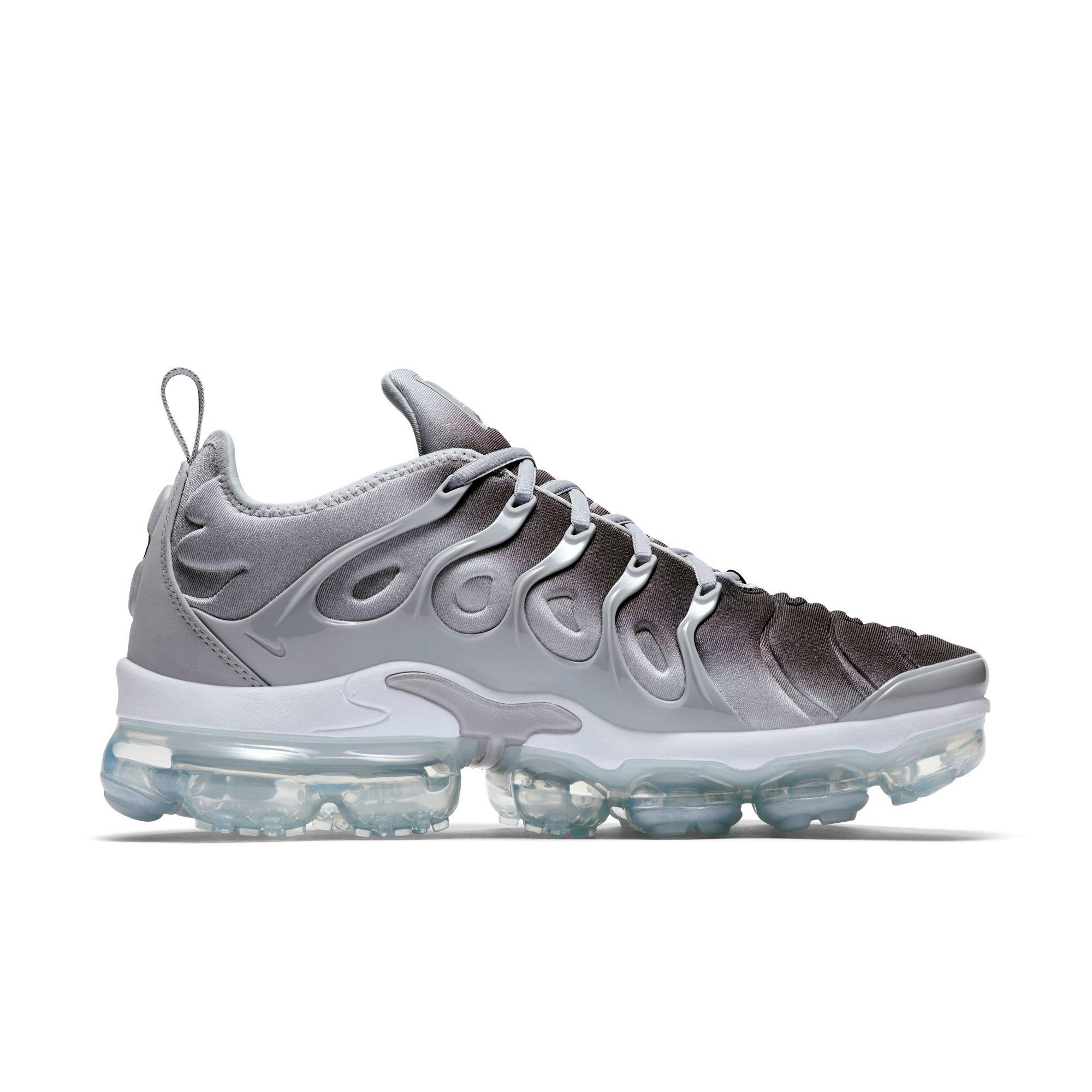 gray and white vapormax plus