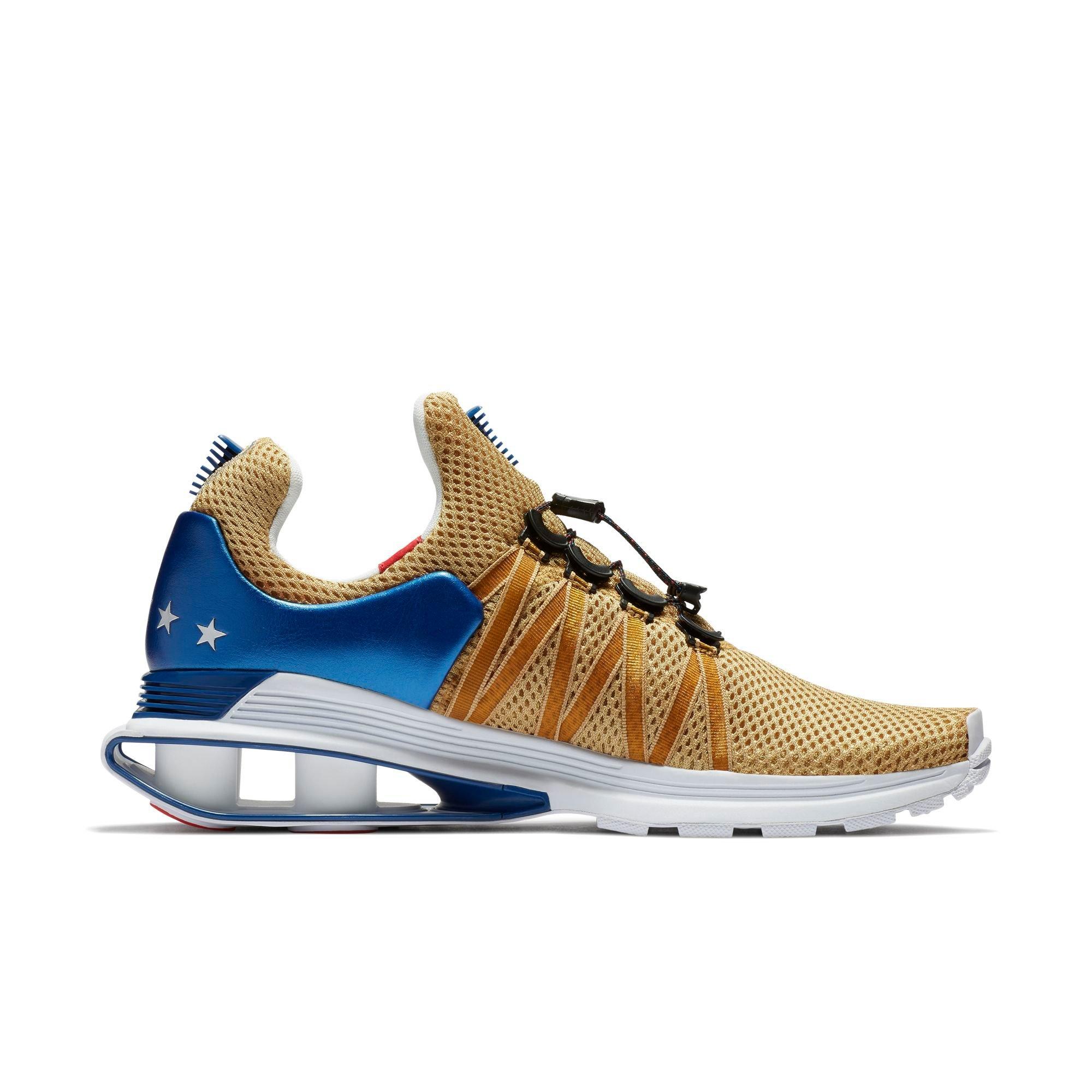 nike shox gravity women's gold