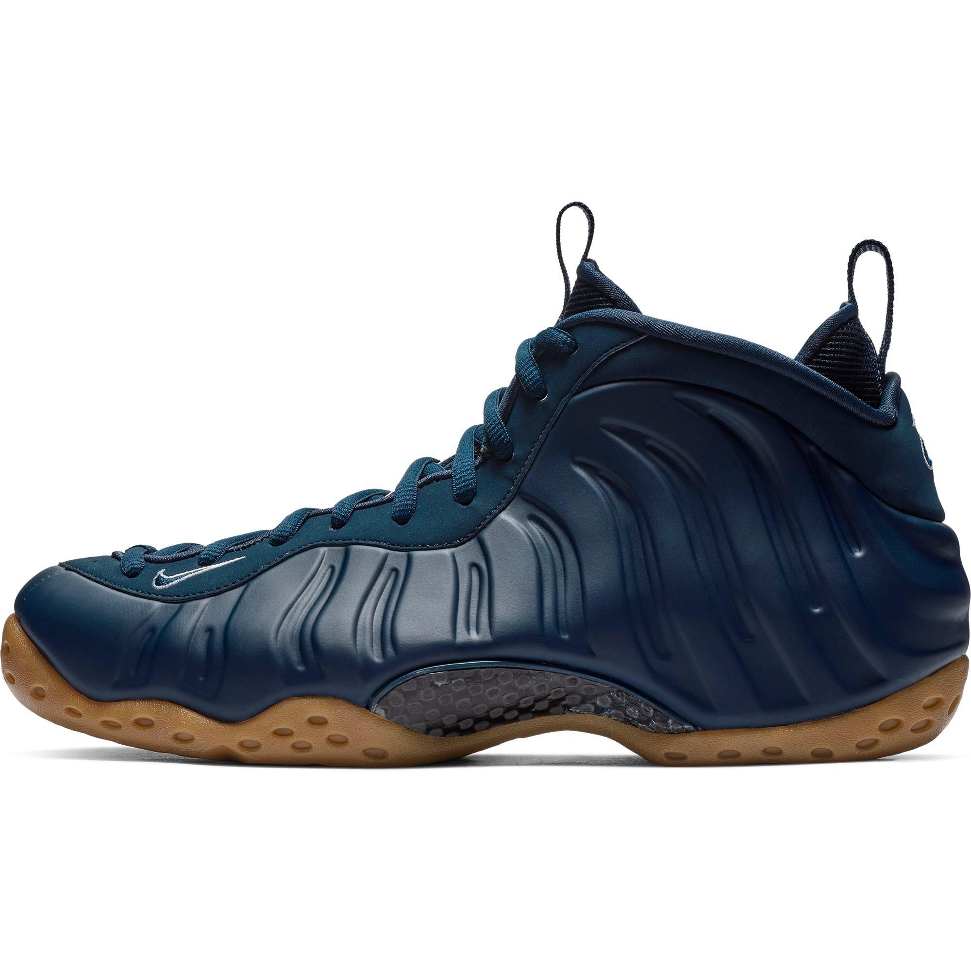 navy blue and white foamposites