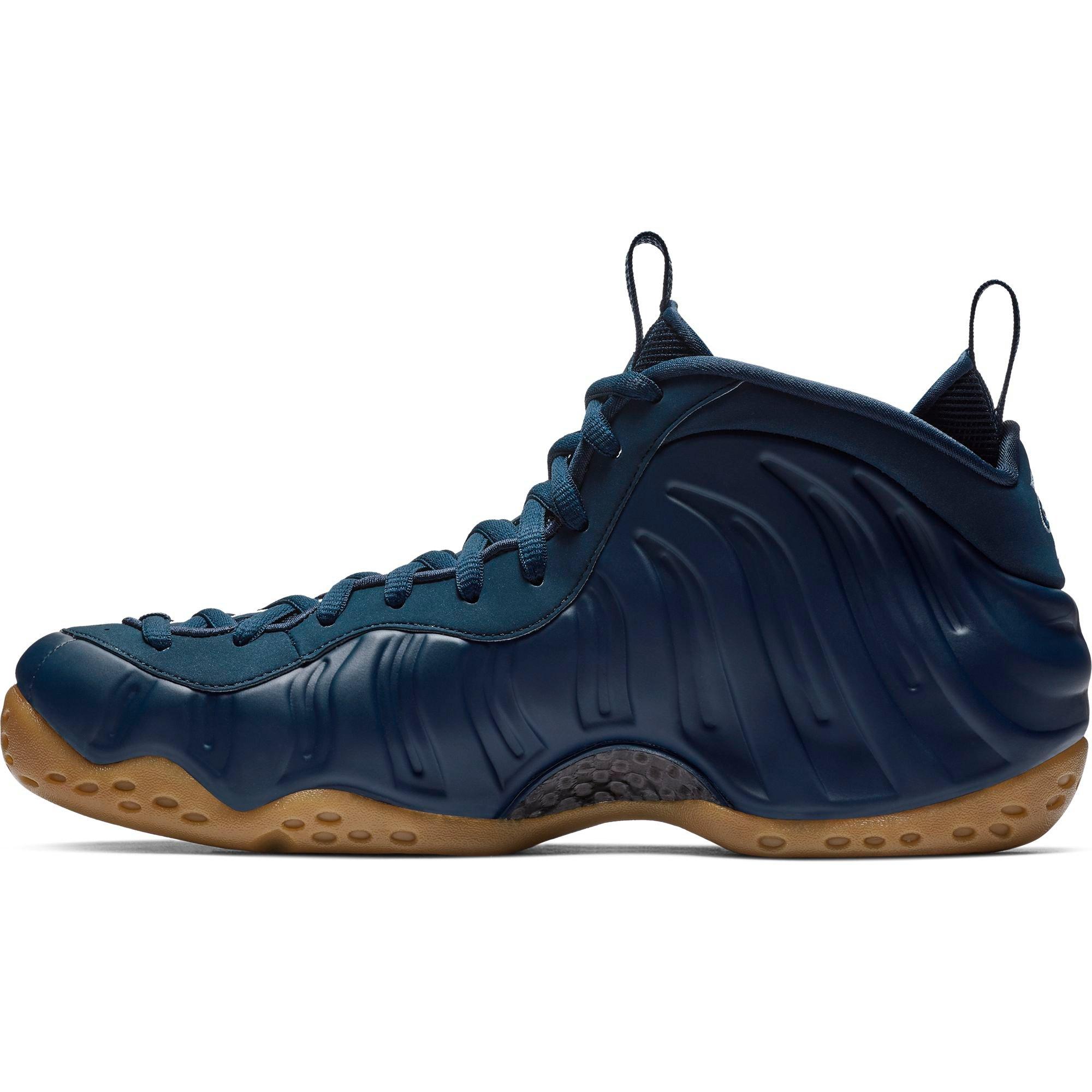 navy blue nike foams