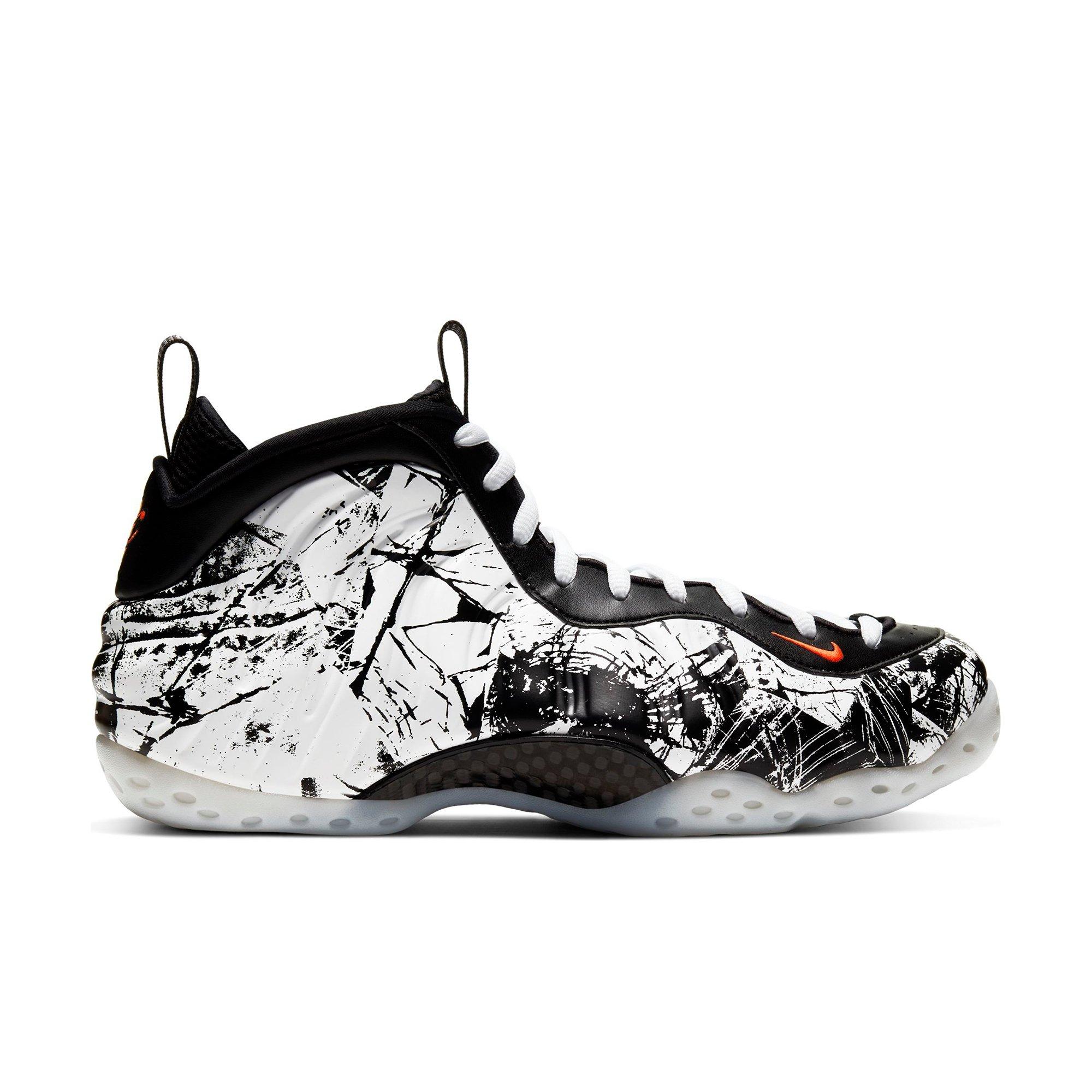 silver black and orange foamposites