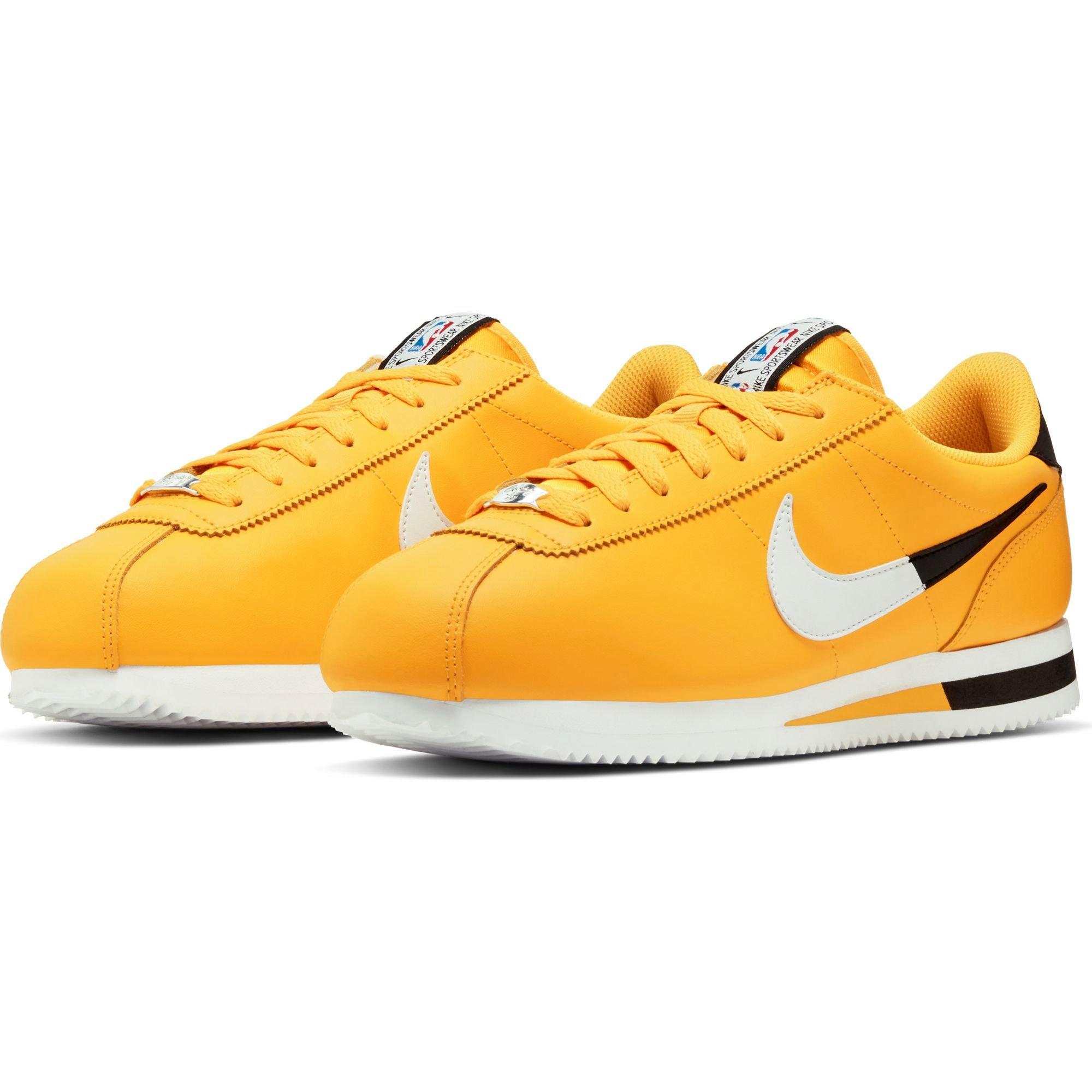 nike cortez yellow and black