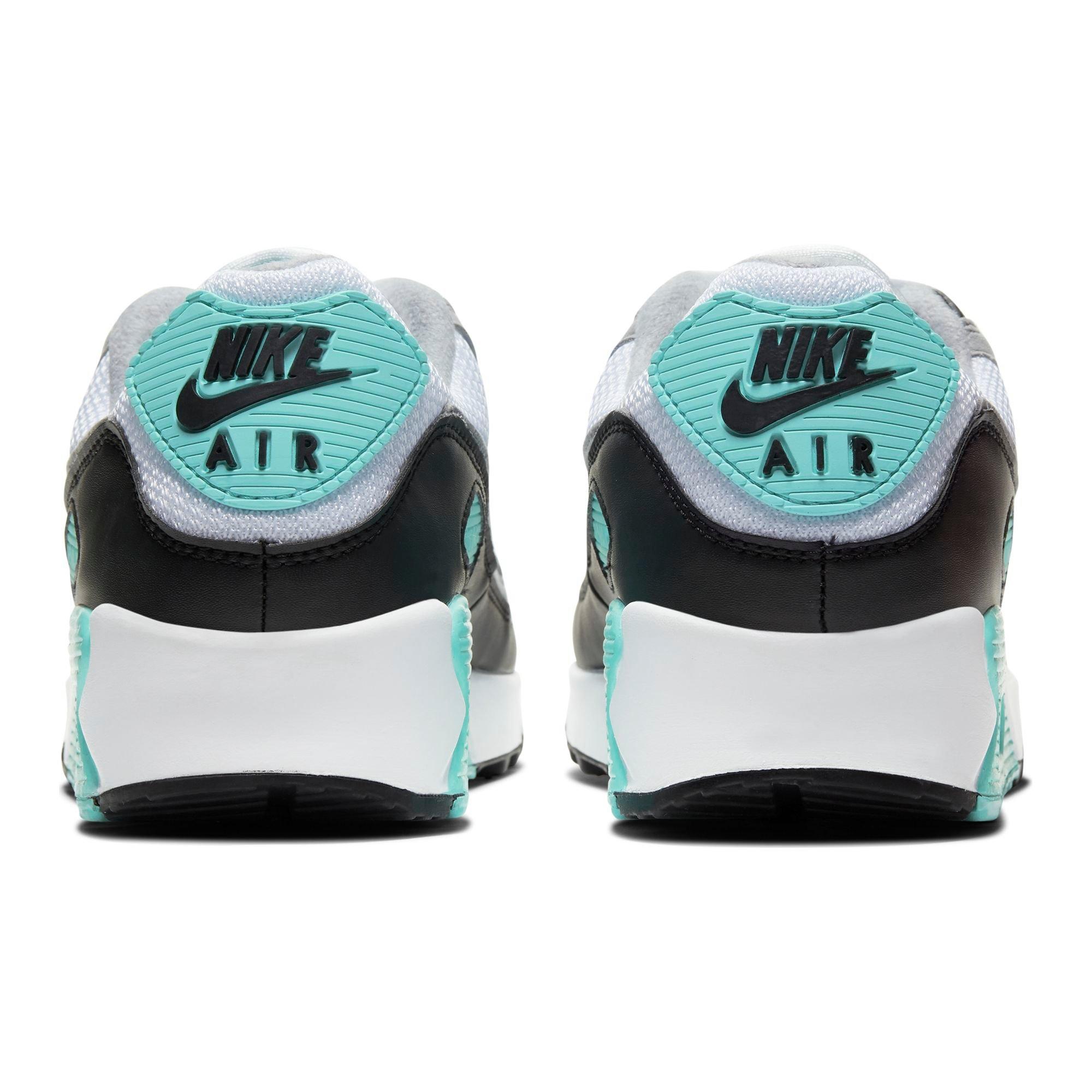 white and turquoise nike shoes