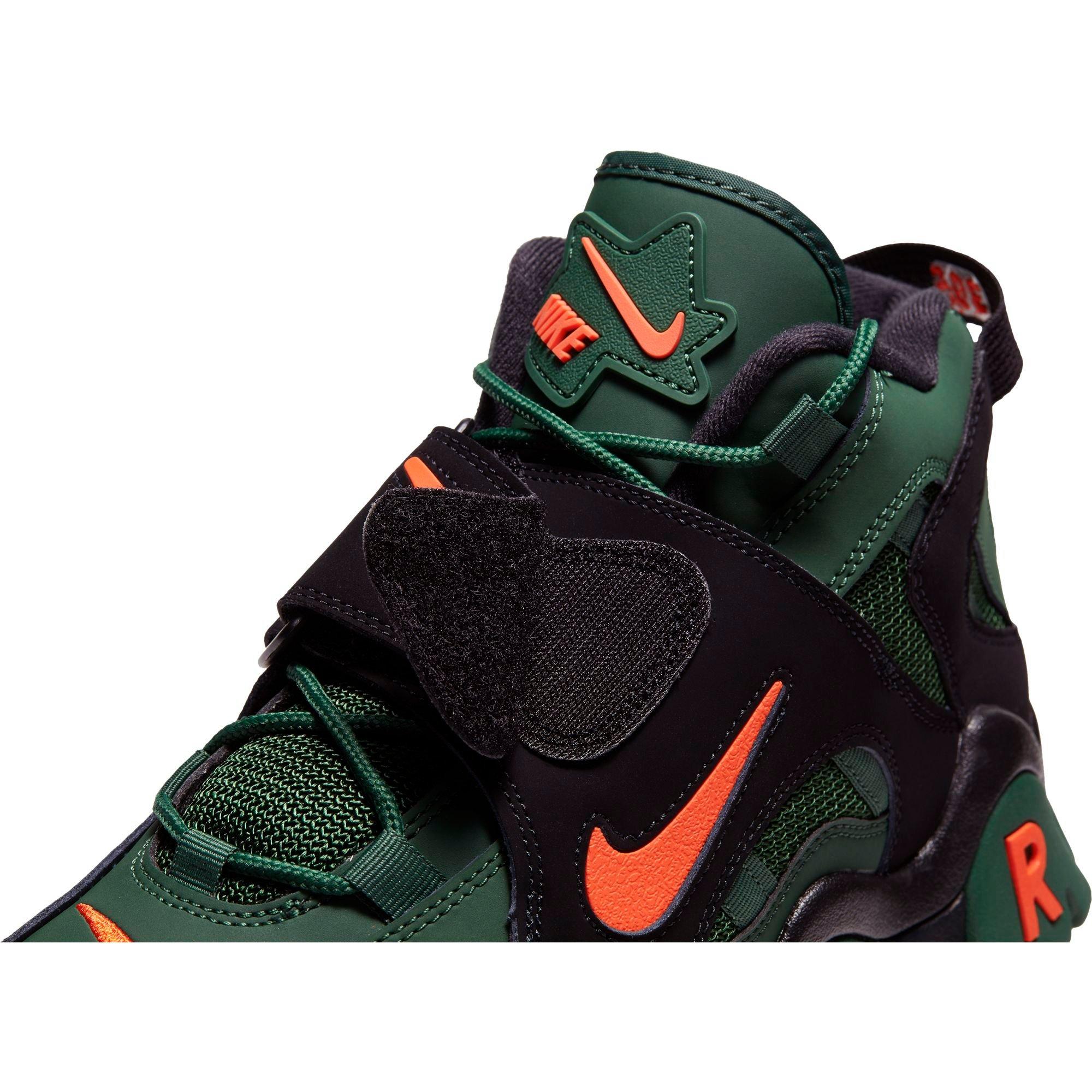green and orange nike barrage