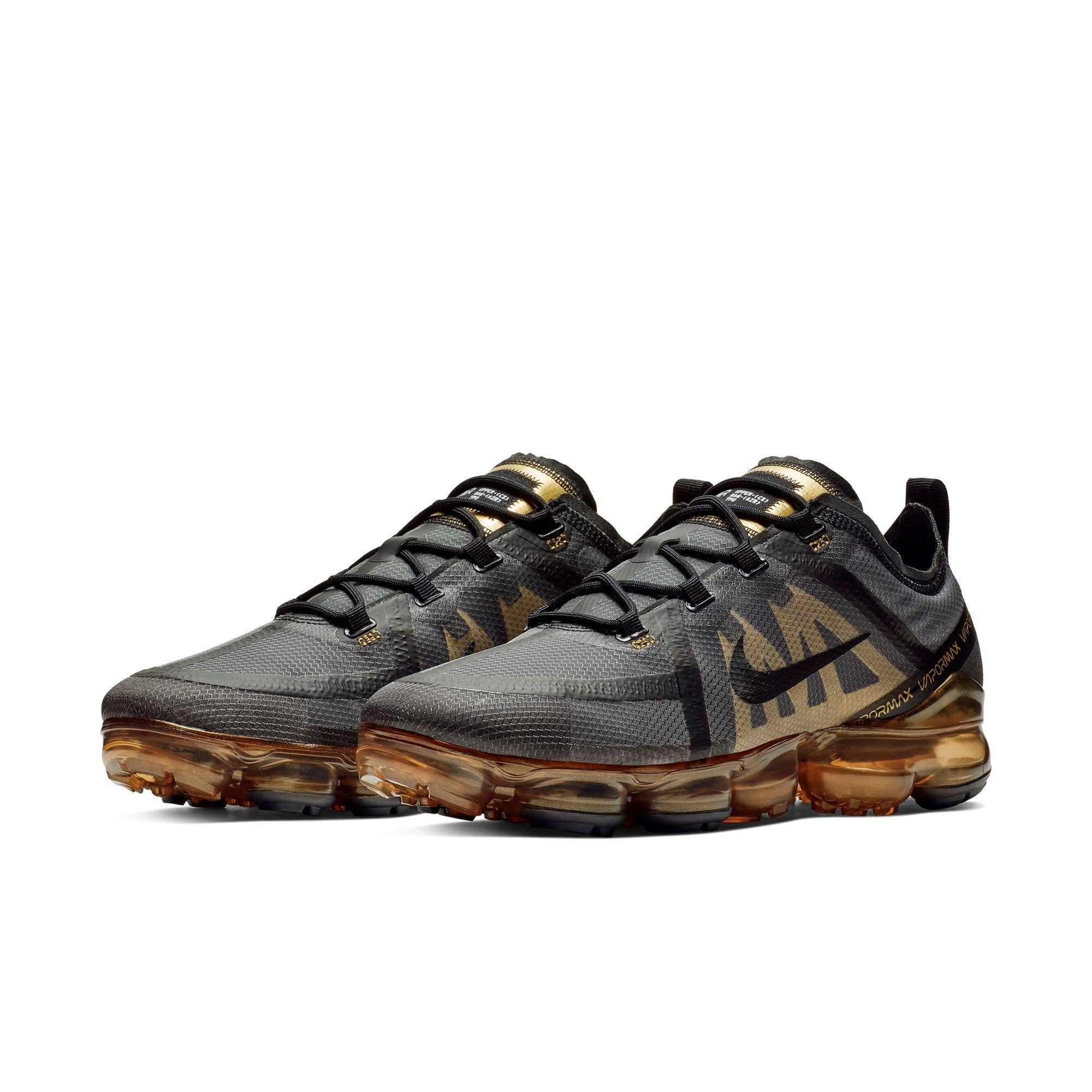 vapormaxes black and gold