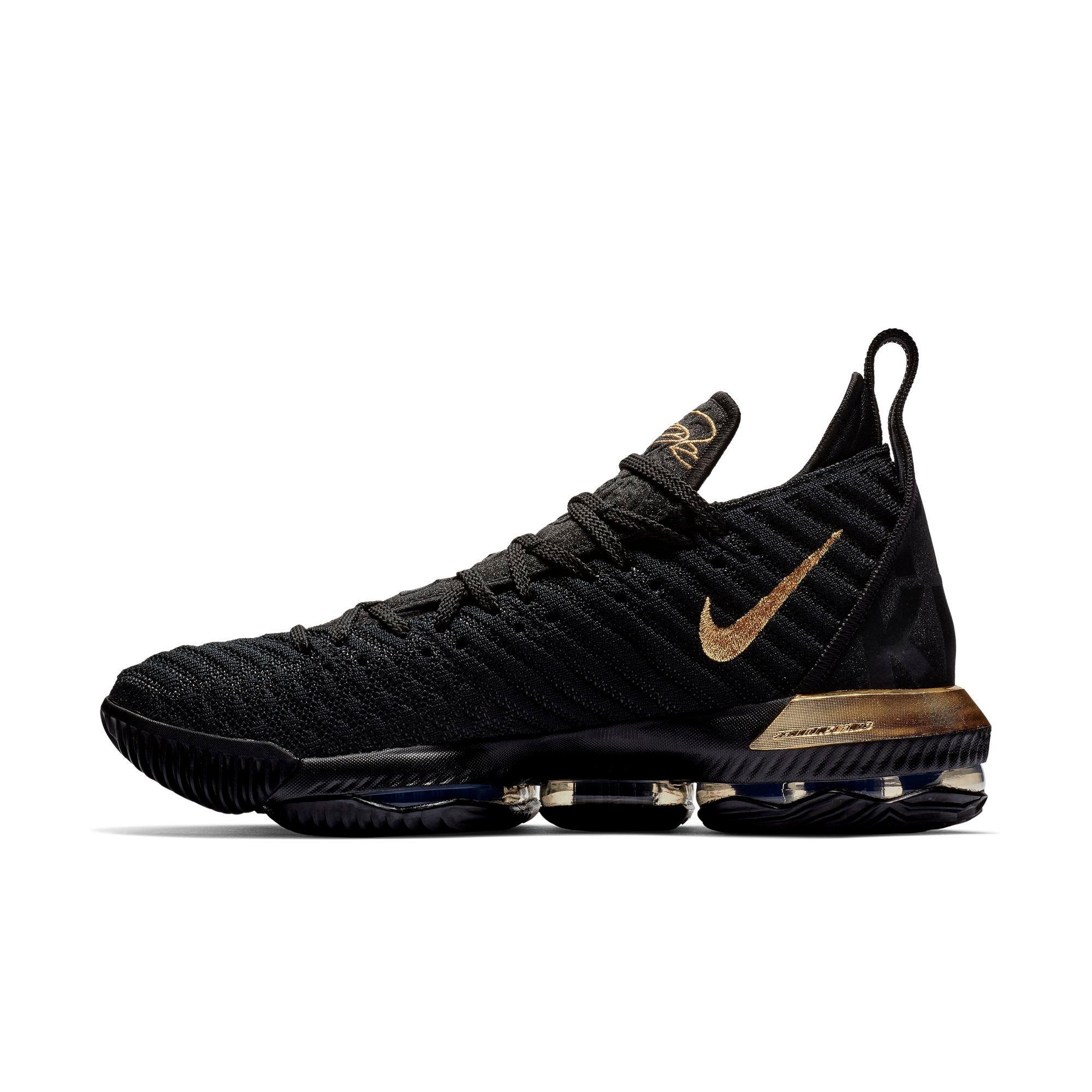 lebron gold and black shoes