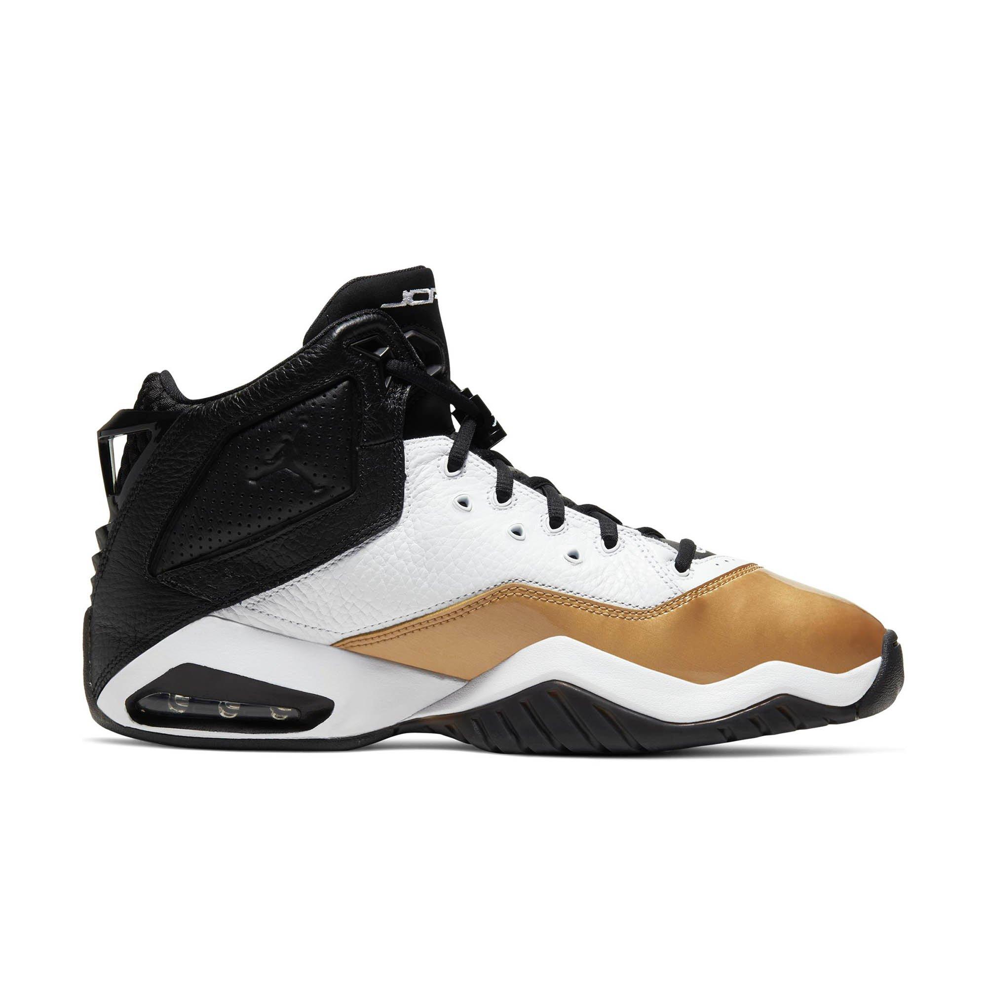 white and black and gold jordans