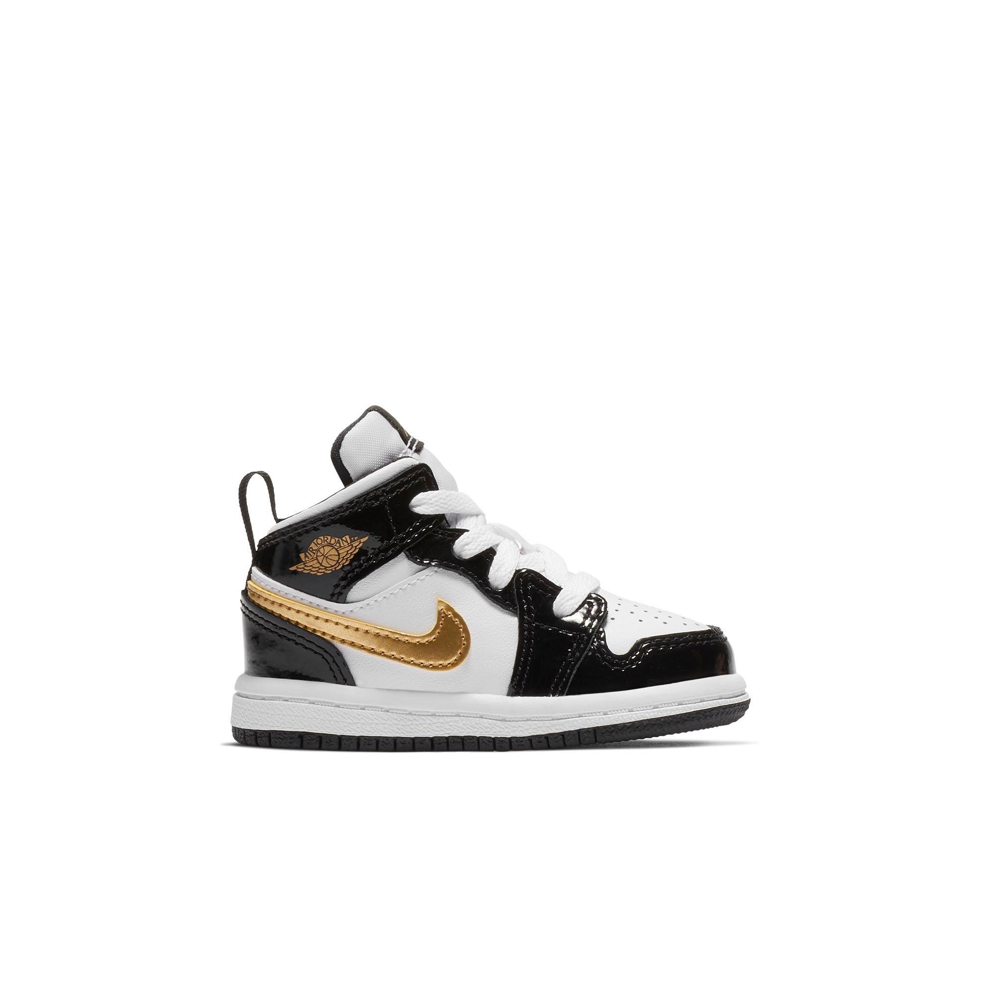 kids black and gold shoes