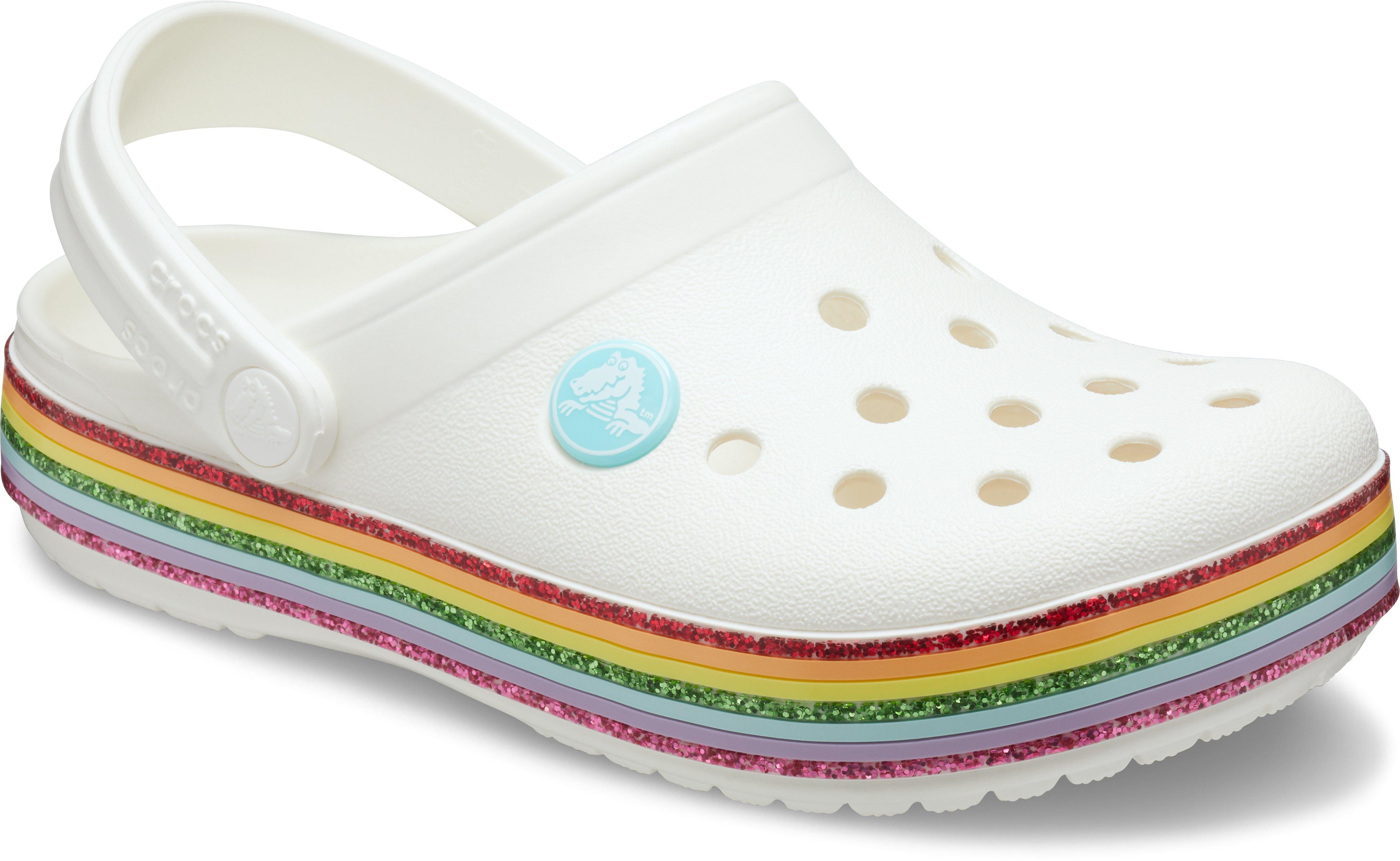 white crocs with rainbow bottom